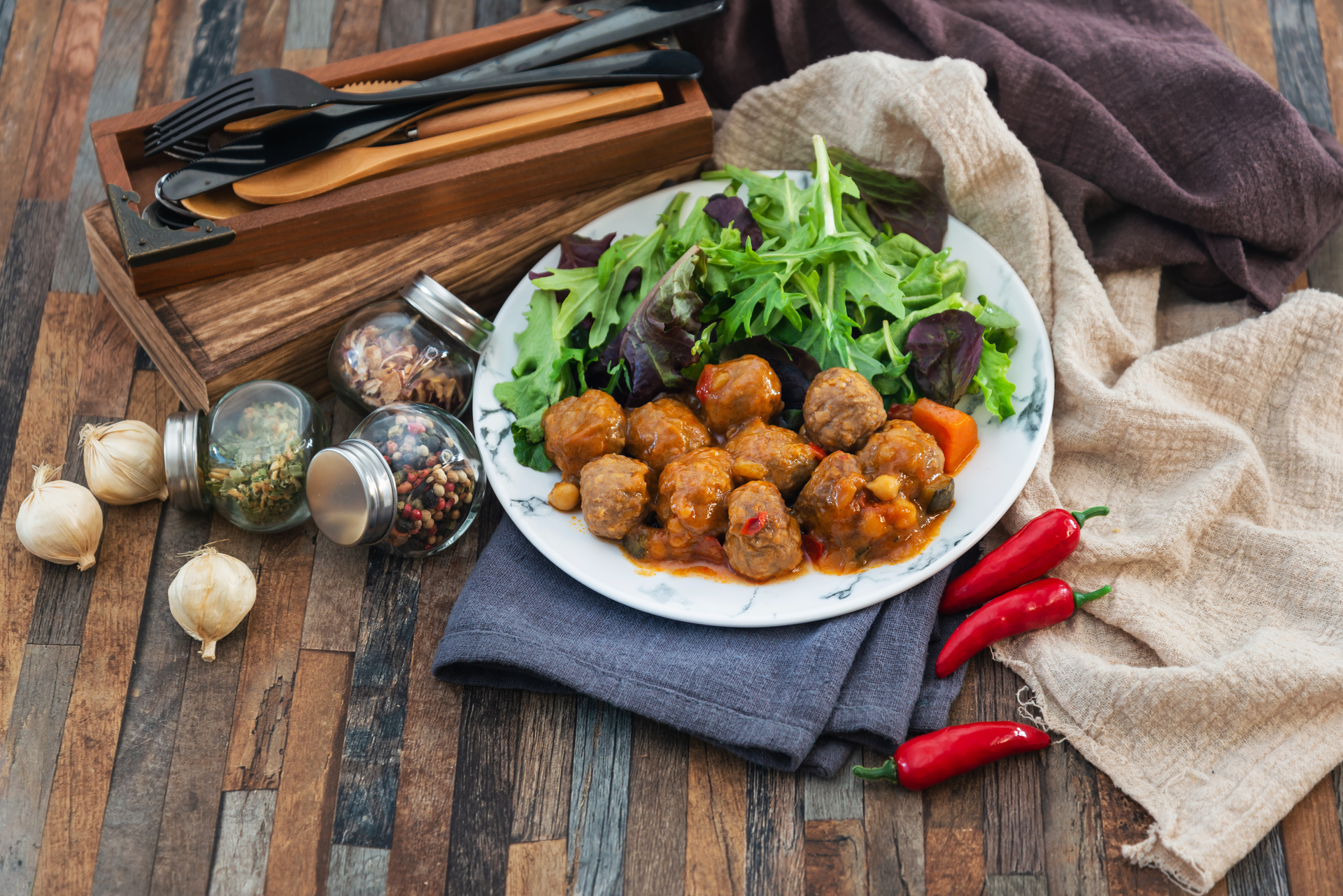 Honey-Ginger Lao Meatballs with Kaffir Lime Leaves — Appetizer served and photographed from above