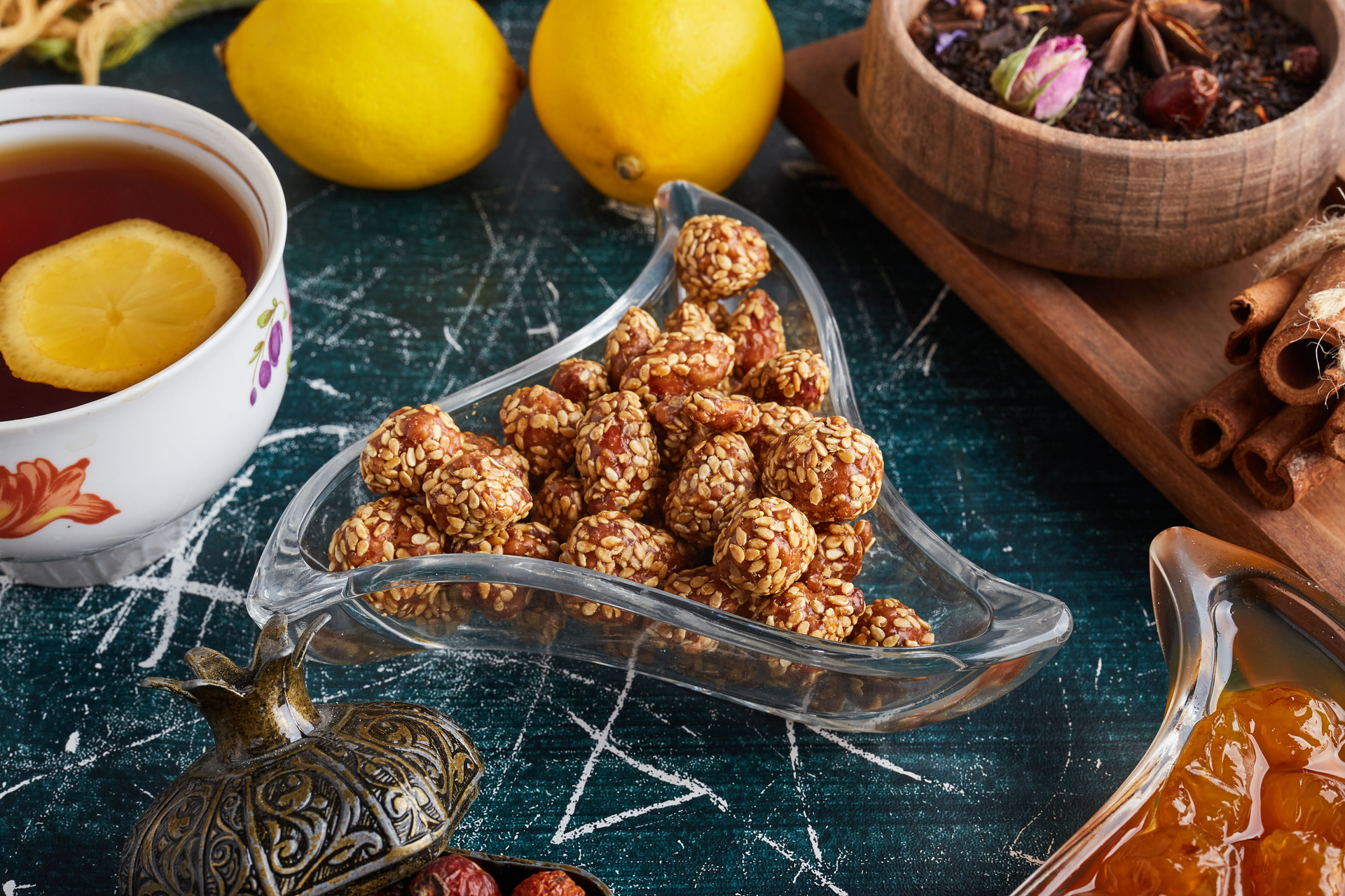 Overhead flat-lay of all ingredients for Honeyed Moroccan Ghoriba with Sesame Seeds laid out on a kitchen surface.
