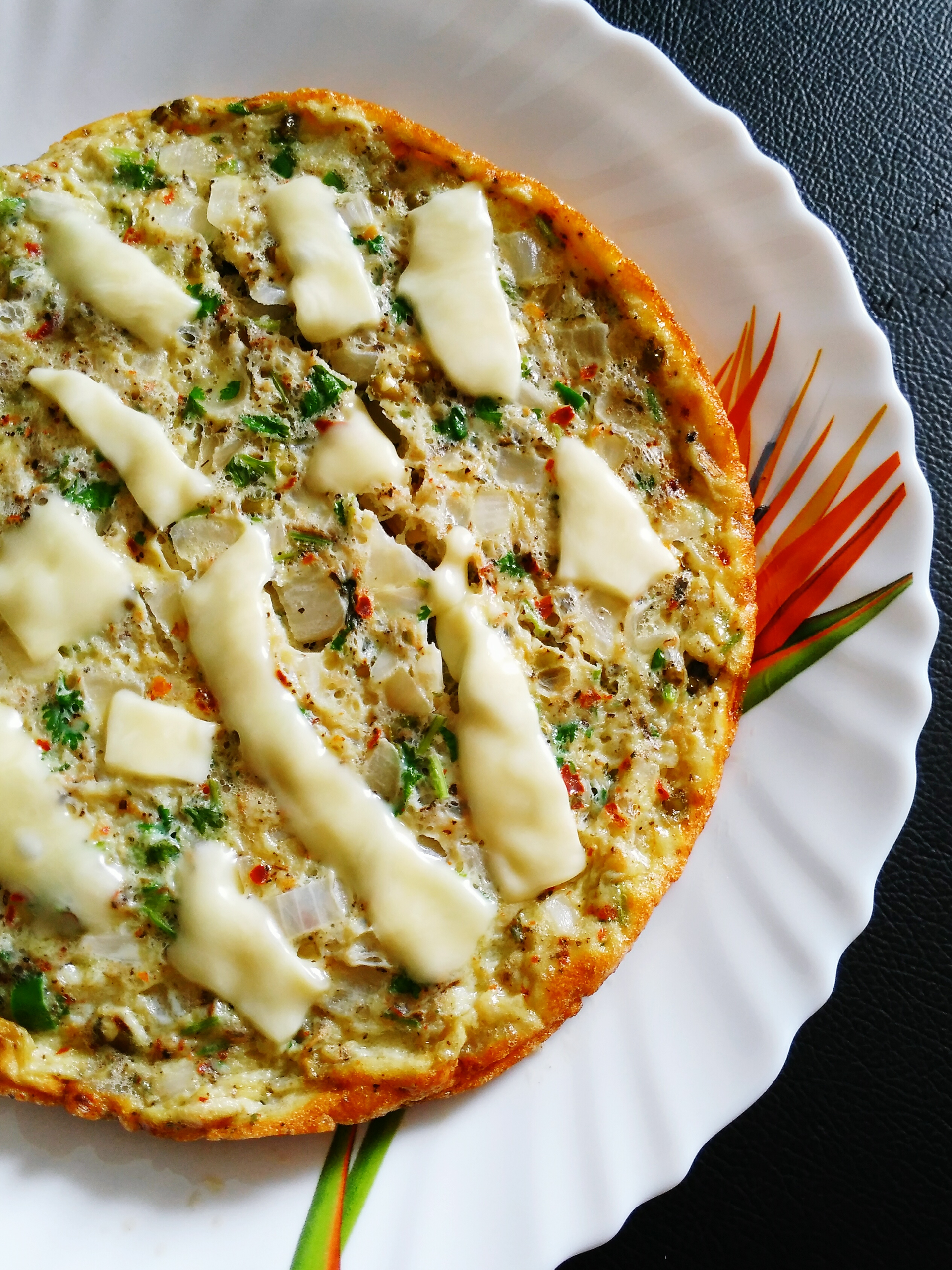 Hungarian Langos with Garlic Sour Cream and Cheese — Snack served and photographed from above