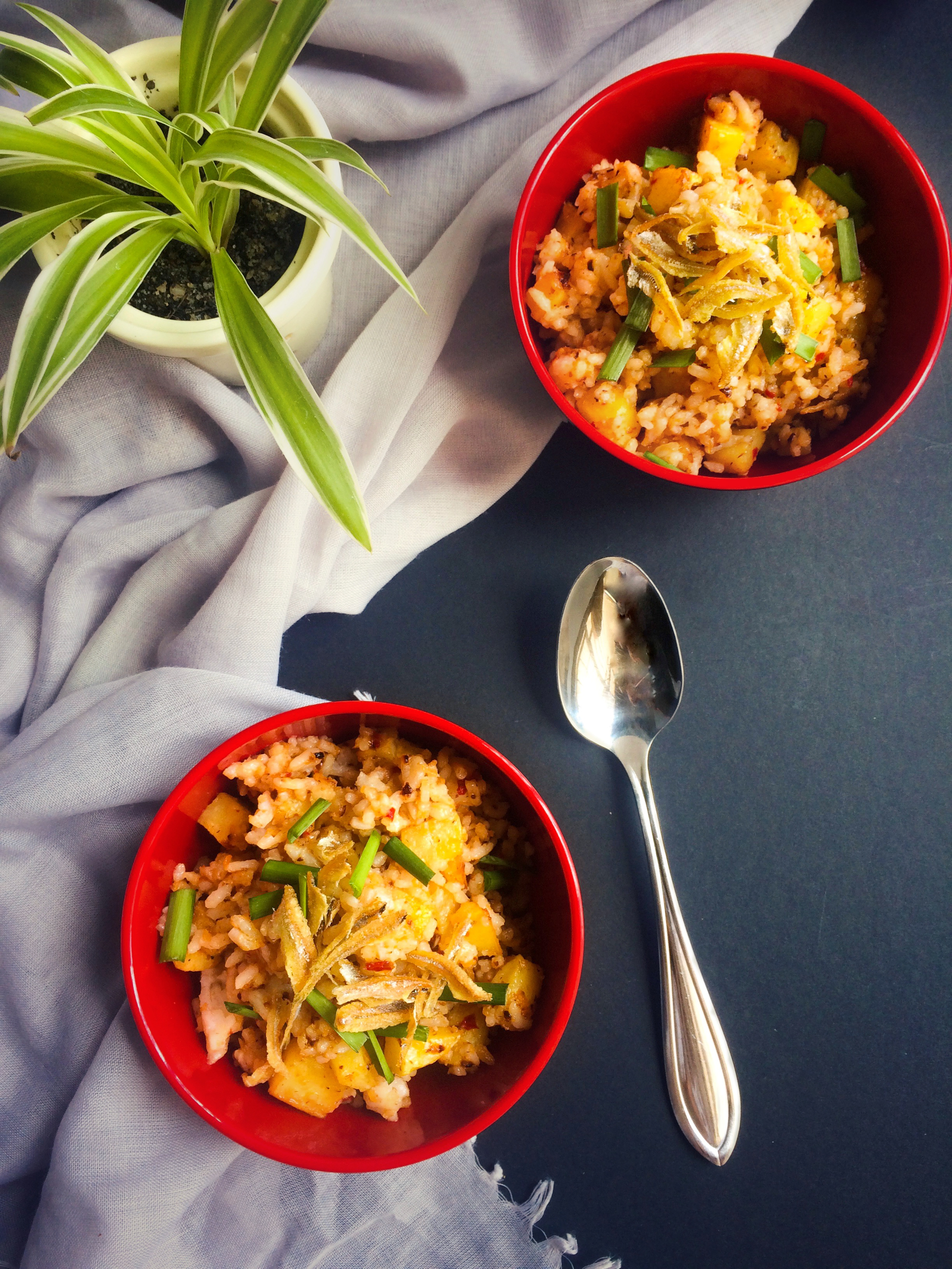 Overhead flat-lay of all ingredients for Hungarian Lecsó with Paprika and Rice Noodles laid out on a kitchen surface.