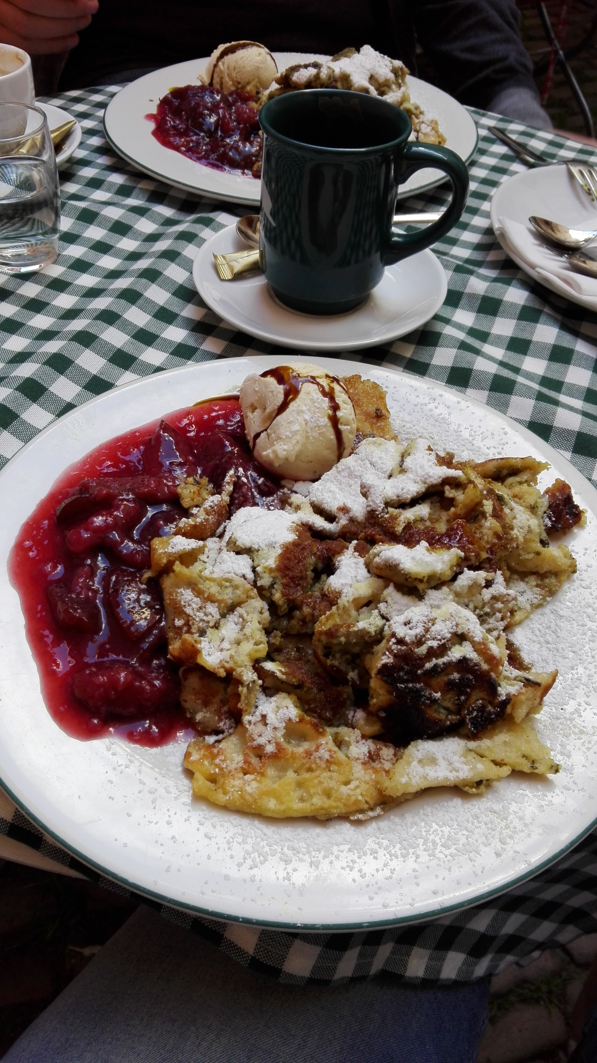 Overhead flat-lay of all ingredients for Icelandic Pönnukökur with Rhubarb Compote and Cream laid out on a kitchen surface.