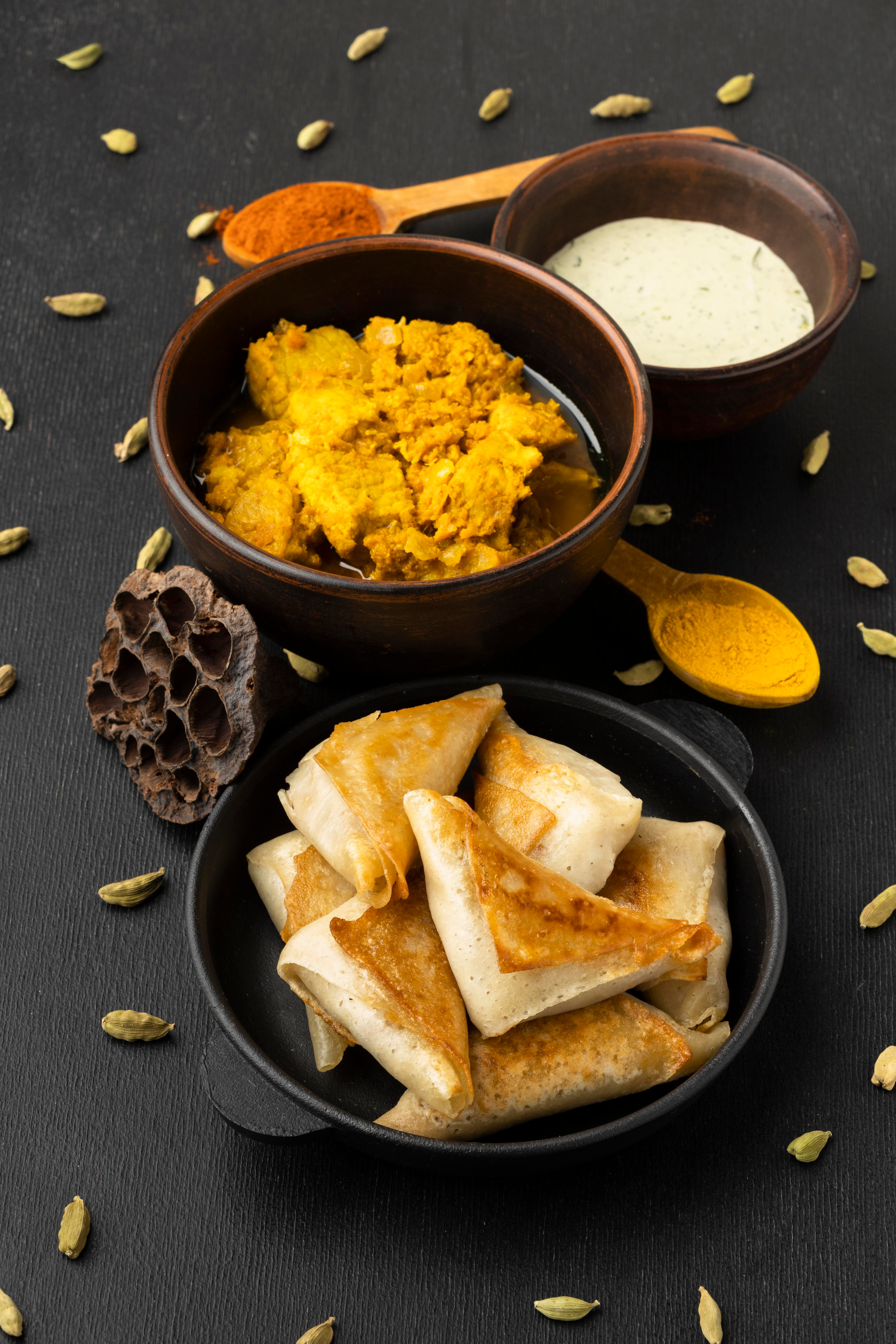 Overhead flat-lay of all ingredients for Indian Dhokla with Mustard Seed Tempering laid out on a kitchen surface.