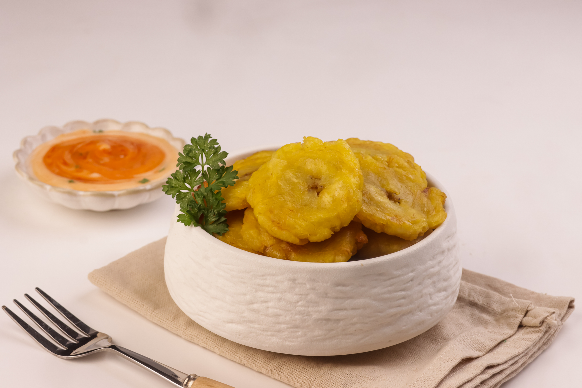 Overhead flat-lay of all ingredients for Indonesian Bakwan Jagung laid out on a kitchen surface.
