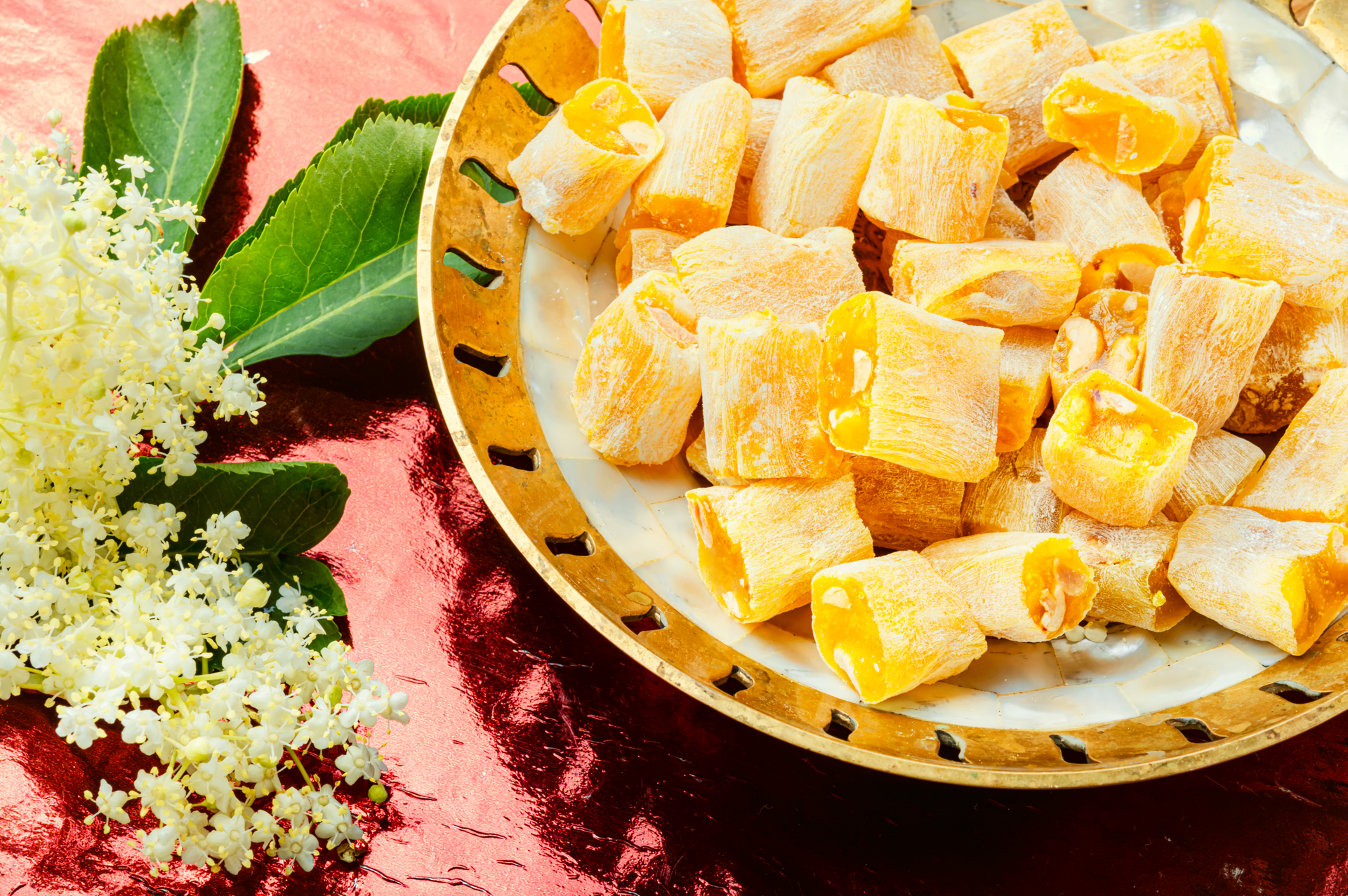 Overhead flat-lay of all ingredients for Indonesian Tempeh Manis with Sweet Soy and Pineapple laid out on a kitchen surface.