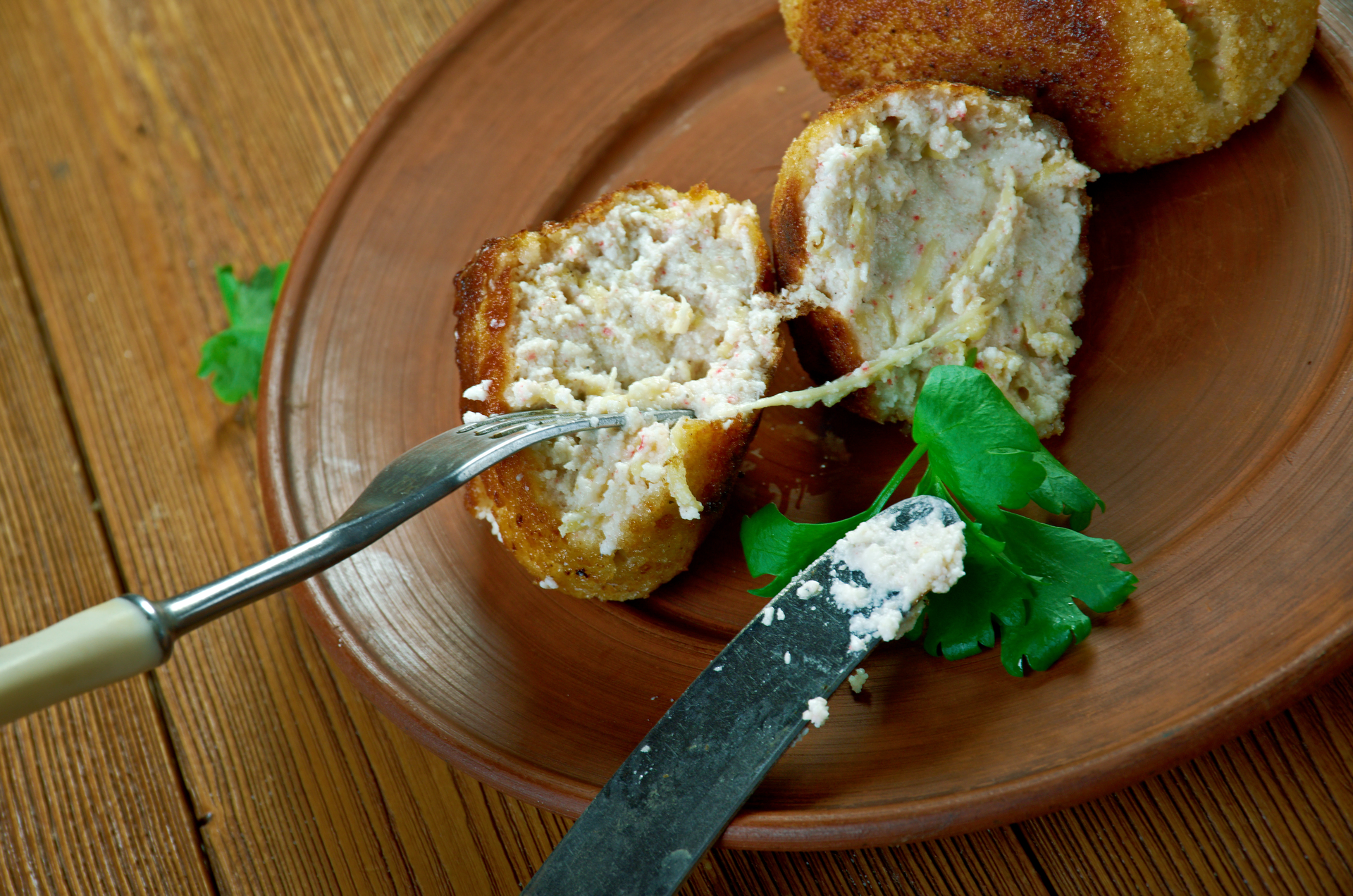 Overhead flat-lay of all ingredients for Arancini recipe: crispy risotto balls with truffle aioli laid out on a kitchen surface.