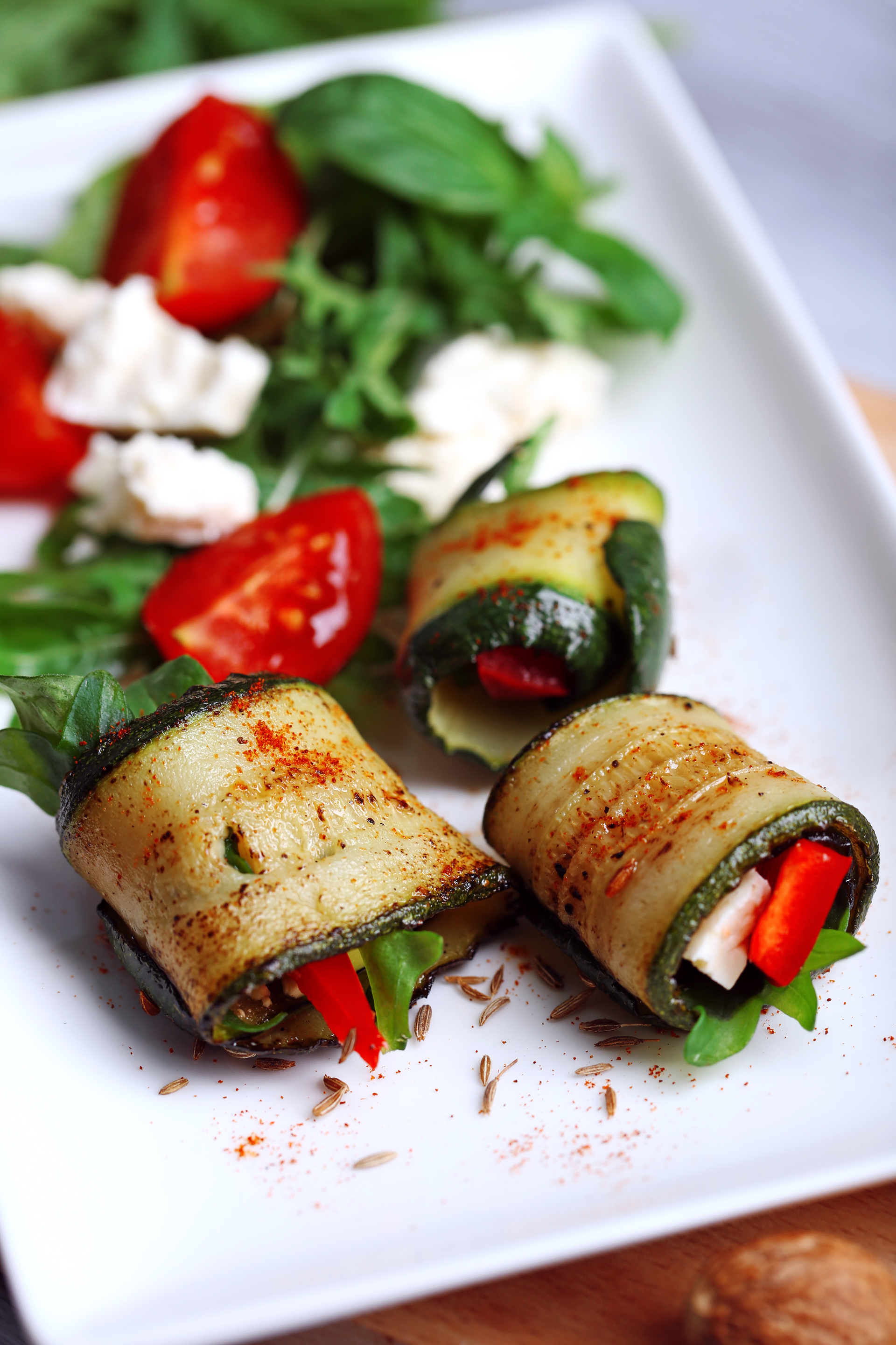 Overhead flat-lay of all ingredients for Italian Eggplant Involtini with Ricotta and Basil Filling laid out on a kitchen surface.