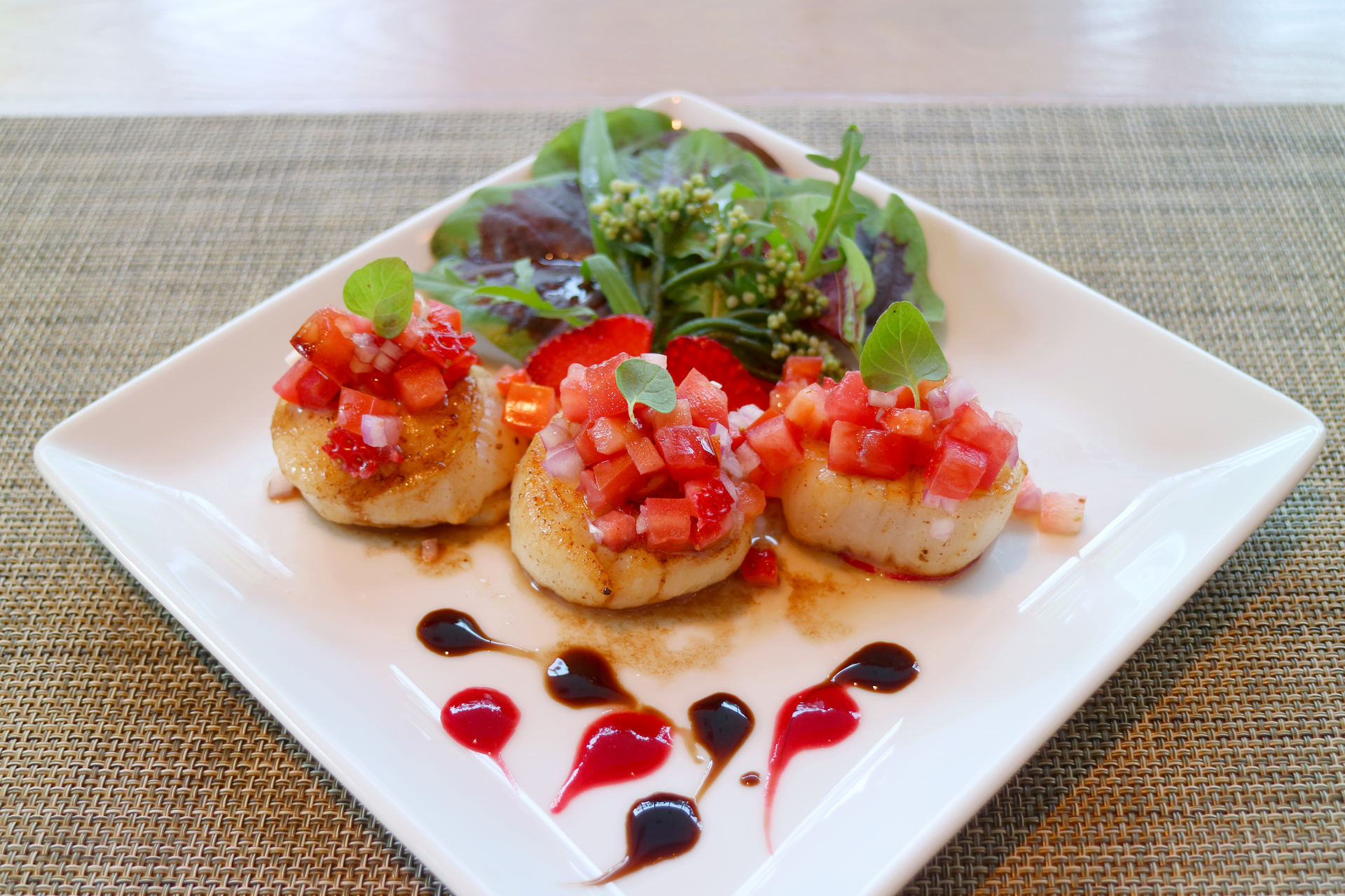 Overhead flat-lay of all ingredients for Italian Lemon Ricotta Stuffed Calamari with Tomato Basil Sauce laid out on a kitchen surface.