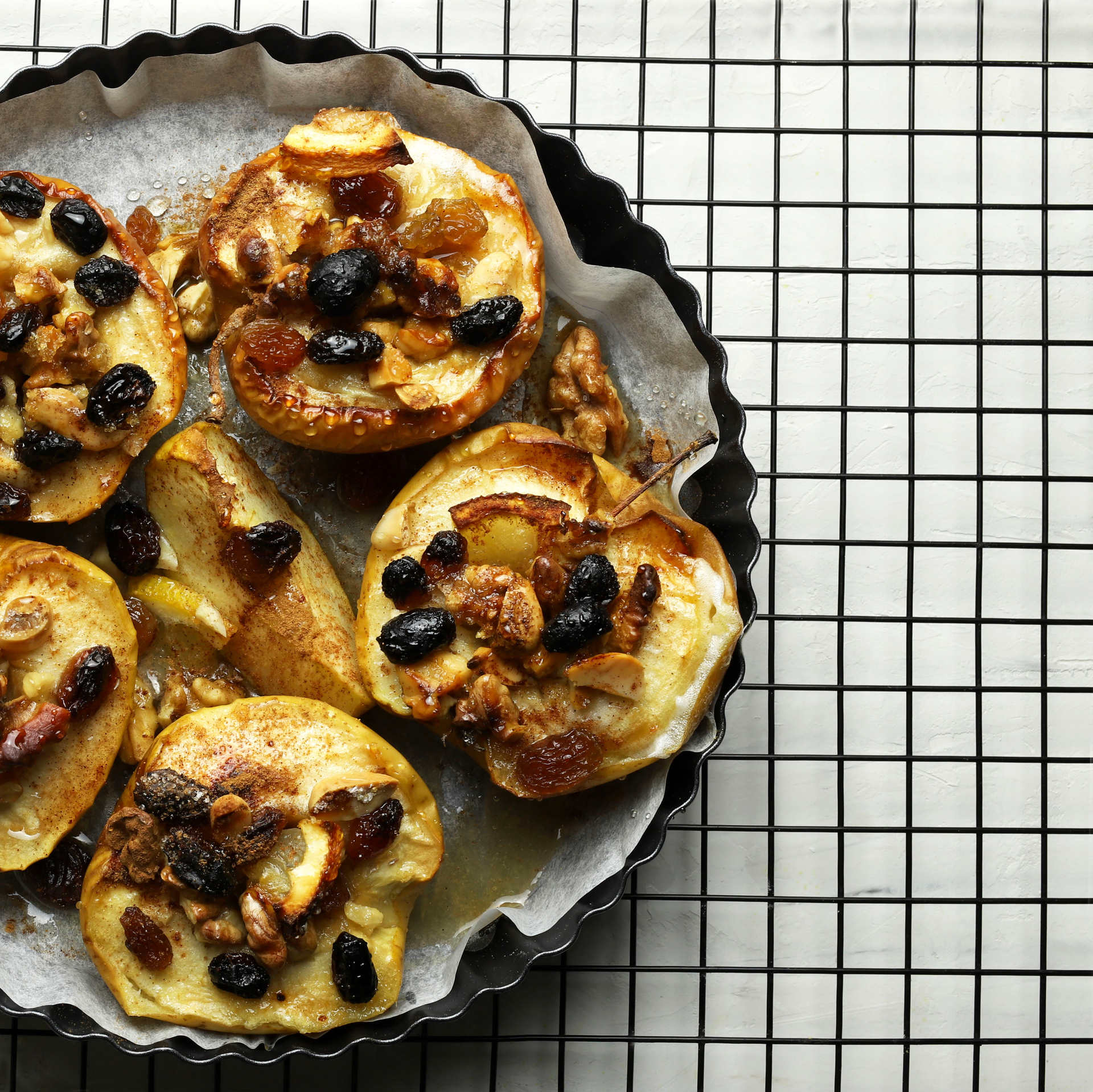 Overhead flat-lay of all ingredients for Italian Pan Pepato with Chocolate and Spices laid out on a kitchen surface.