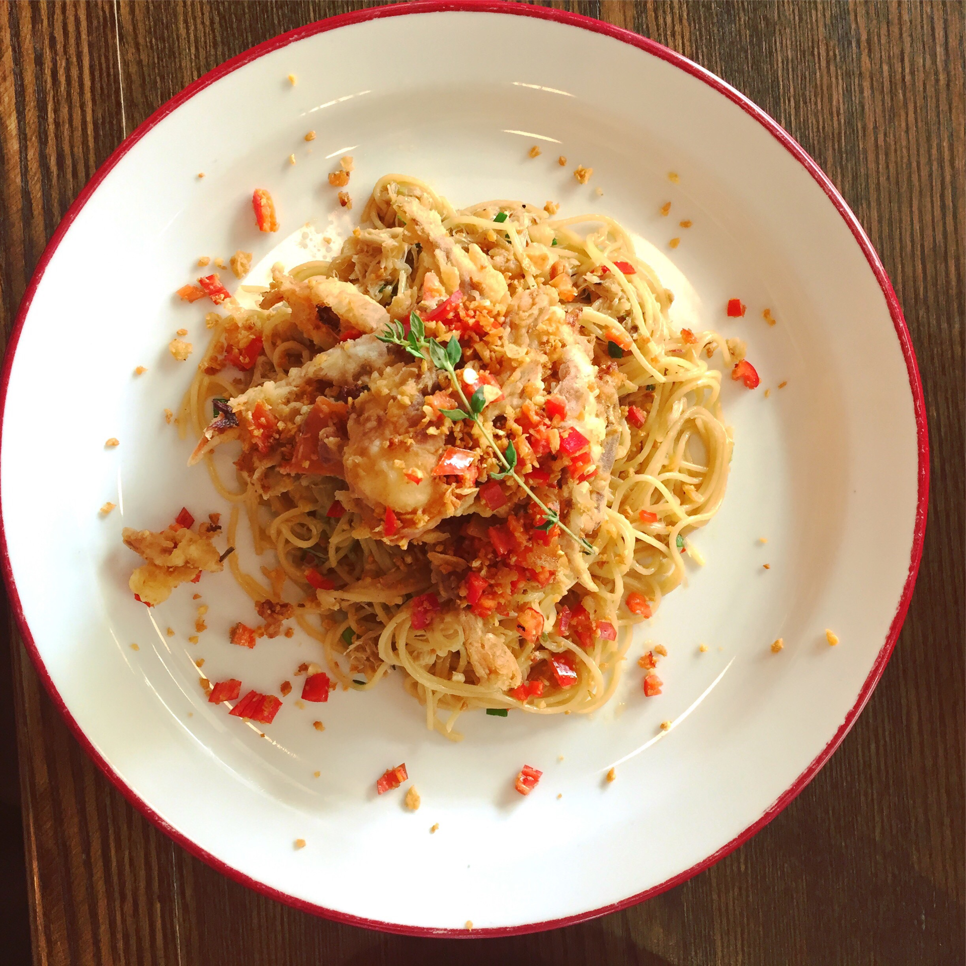 Overhead flat-lay of all ingredients for Italian Pici Pasta with Spicy Nduja and Pecorino Crumble laid out on a kitchen surface.