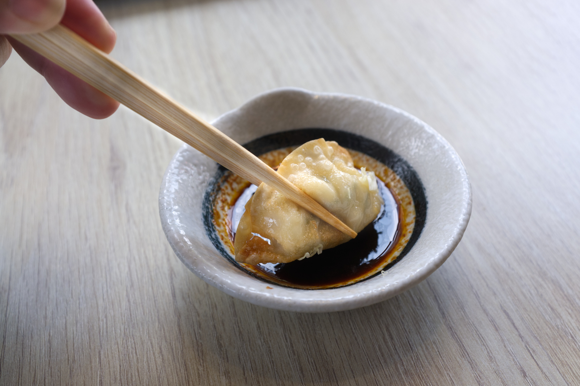 Overhead flat-lay of all ingredients for Japanese Ankimo with Ponzu Dipping Sauce laid out on a kitchen surface.