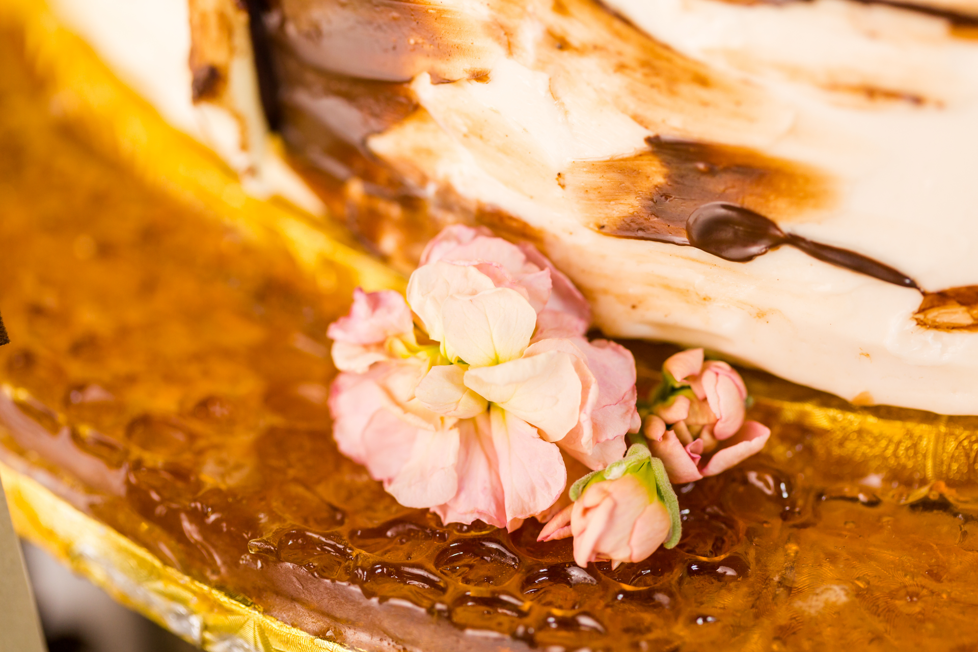 Overhead flat-lay of all ingredients for Japanese Cherry Blossom Pancakes with Yuzu-Honey Drizzle laid out on a kitchen surface.