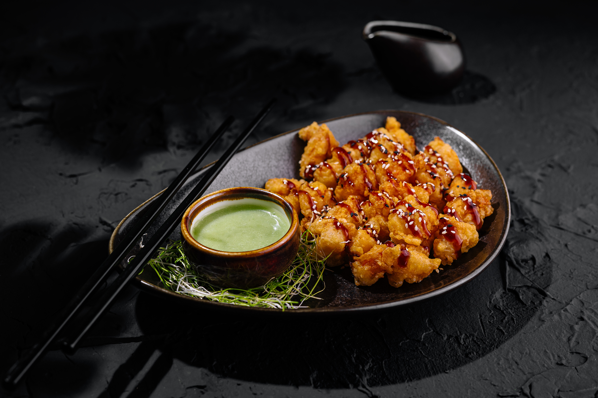 Overhead flat-lay of all ingredients for Japanese Chicken Karaage with Garlic Soy Dipping Sauce laid out on a kitchen surface.