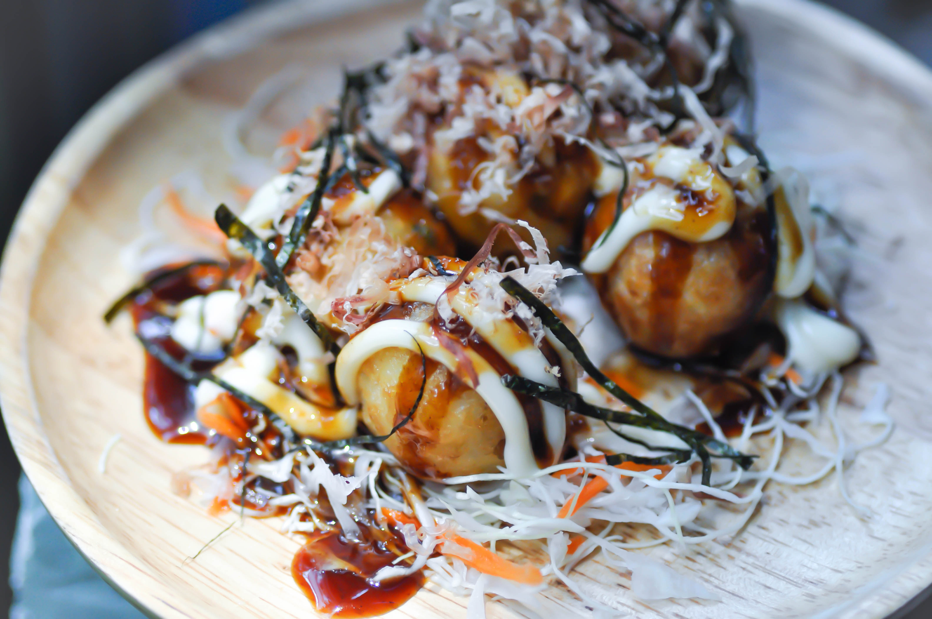 Japanese Takoyaki with Pickled Ginger and Bonito Flakes — Snack served and photographed from above