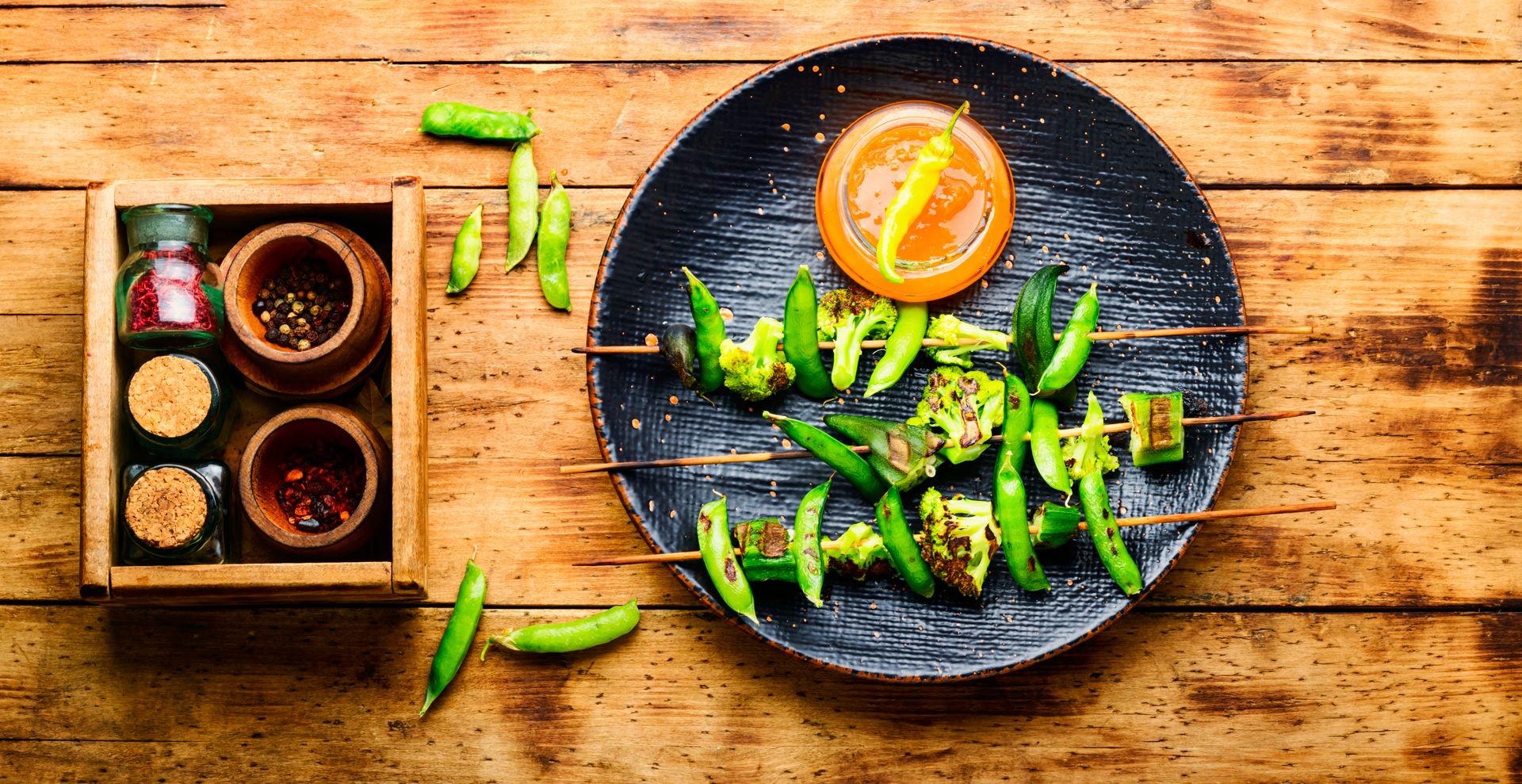 Japanese Yuzu Kosho Chicken Skewers with Grilled Shishito Peppers — Main Course served and photographed from above