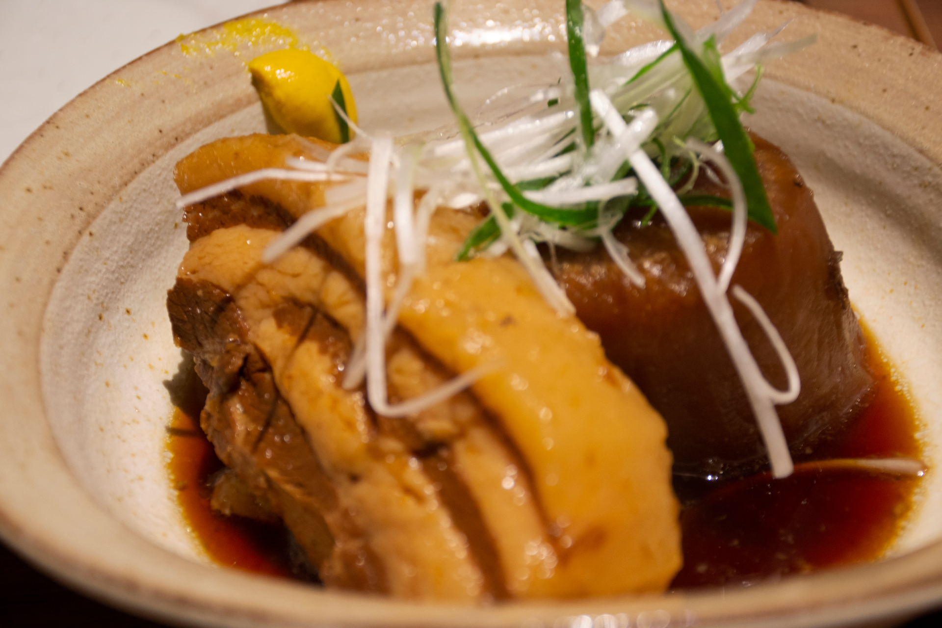 Overhead flat-lay of all ingredients for Japanese Yuzu Soy Marinated Mackerel with Ginger Pickle laid out on a kitchen surface.