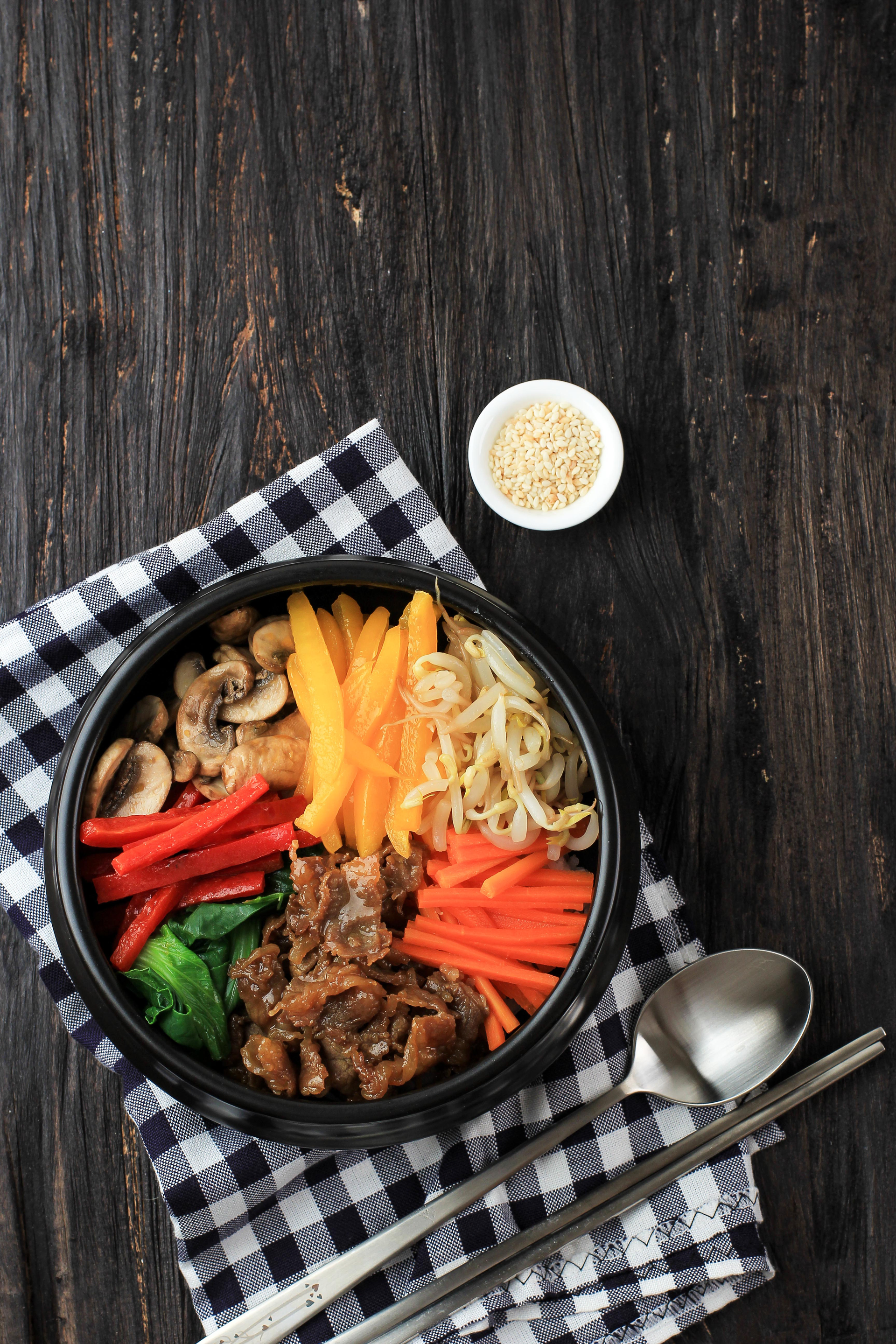 Korean Bibimbap with Gochujang and Marinated Vegetables — Main Course served and photographed from above