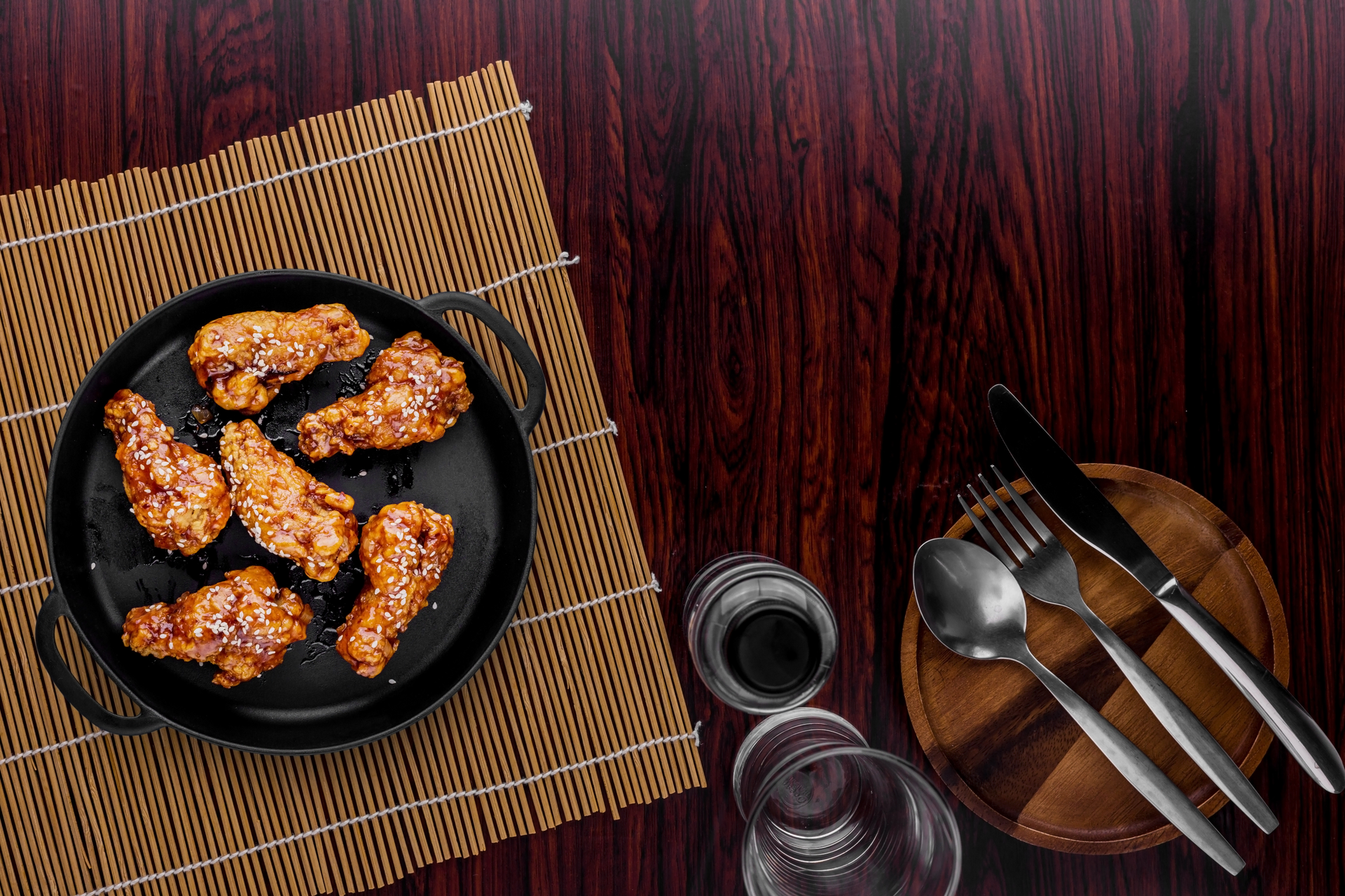 Overhead flat-lay of all ingredients for Korean Gochujang Chicken Wings laid out on a kitchen surface.