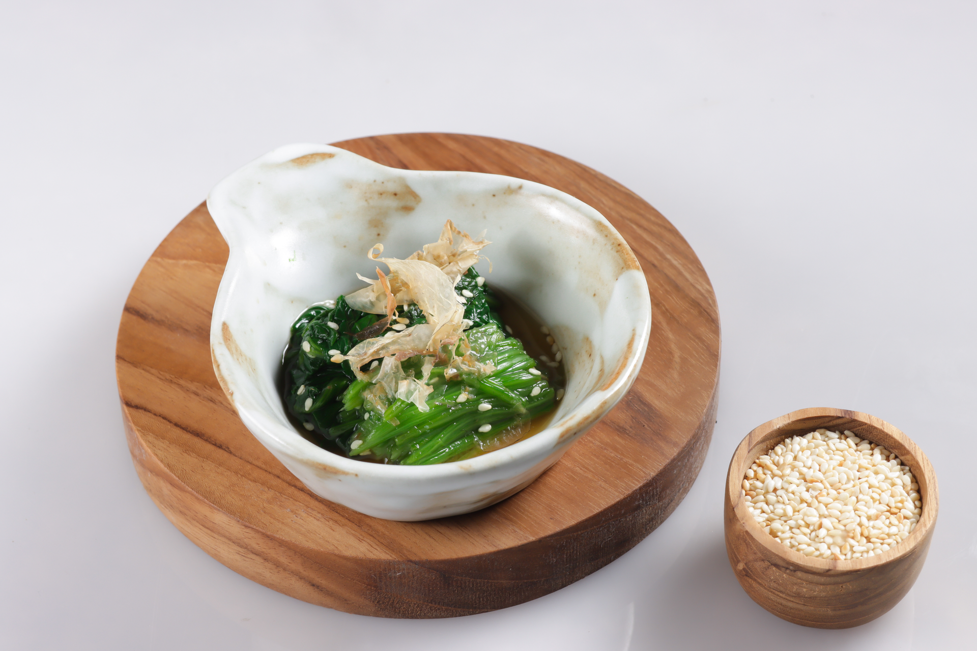 Overhead flat-lay of all ingredients for Korean Jeonbokjuk Abalone Porridge with Seaweed Garnish laid out on a kitchen surface.