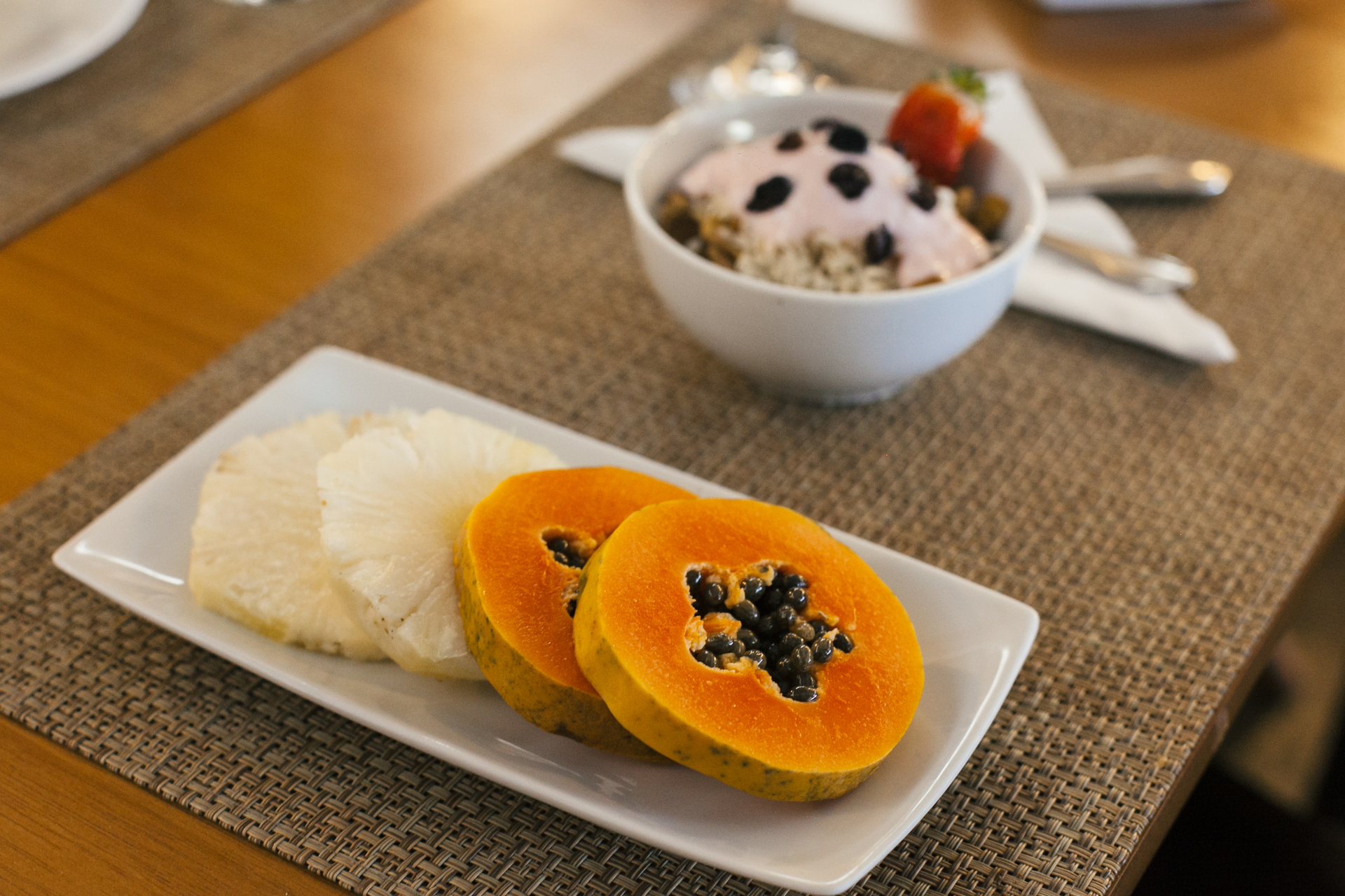 Overhead flat-lay of all ingredients for Korean Pumpkin Porridge (Hobakjuk) with Sweet Rice Ball Garnish laid out on a kitchen surface.