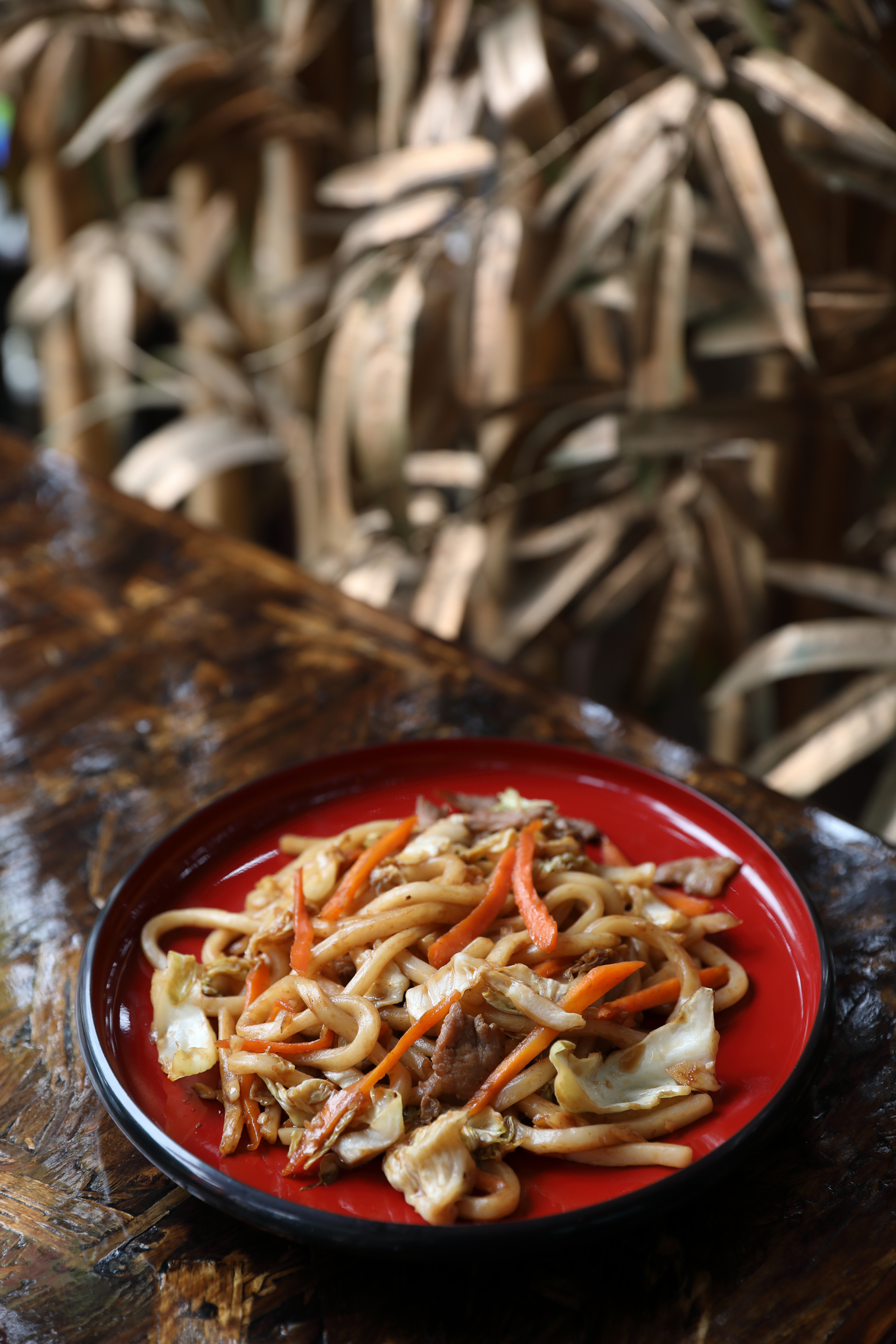 Overhead flat-lay of all ingredients for Korean Sweet Potato Glass Noodles with Minari and Mushrooms laid out on a kitchen surface.