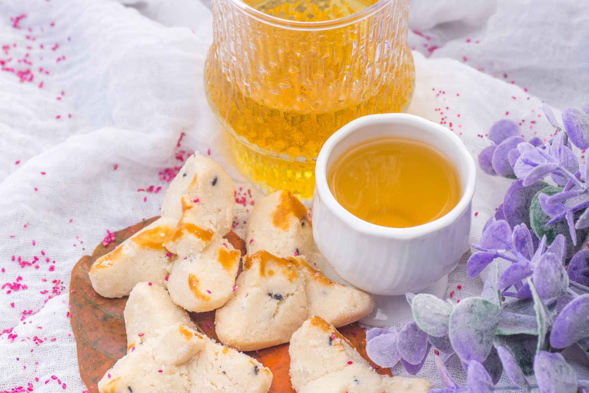 Overhead flat-lay of all ingredients for Lavender-Infused Provence Honey Madeleines laid out on a kitchen surface.