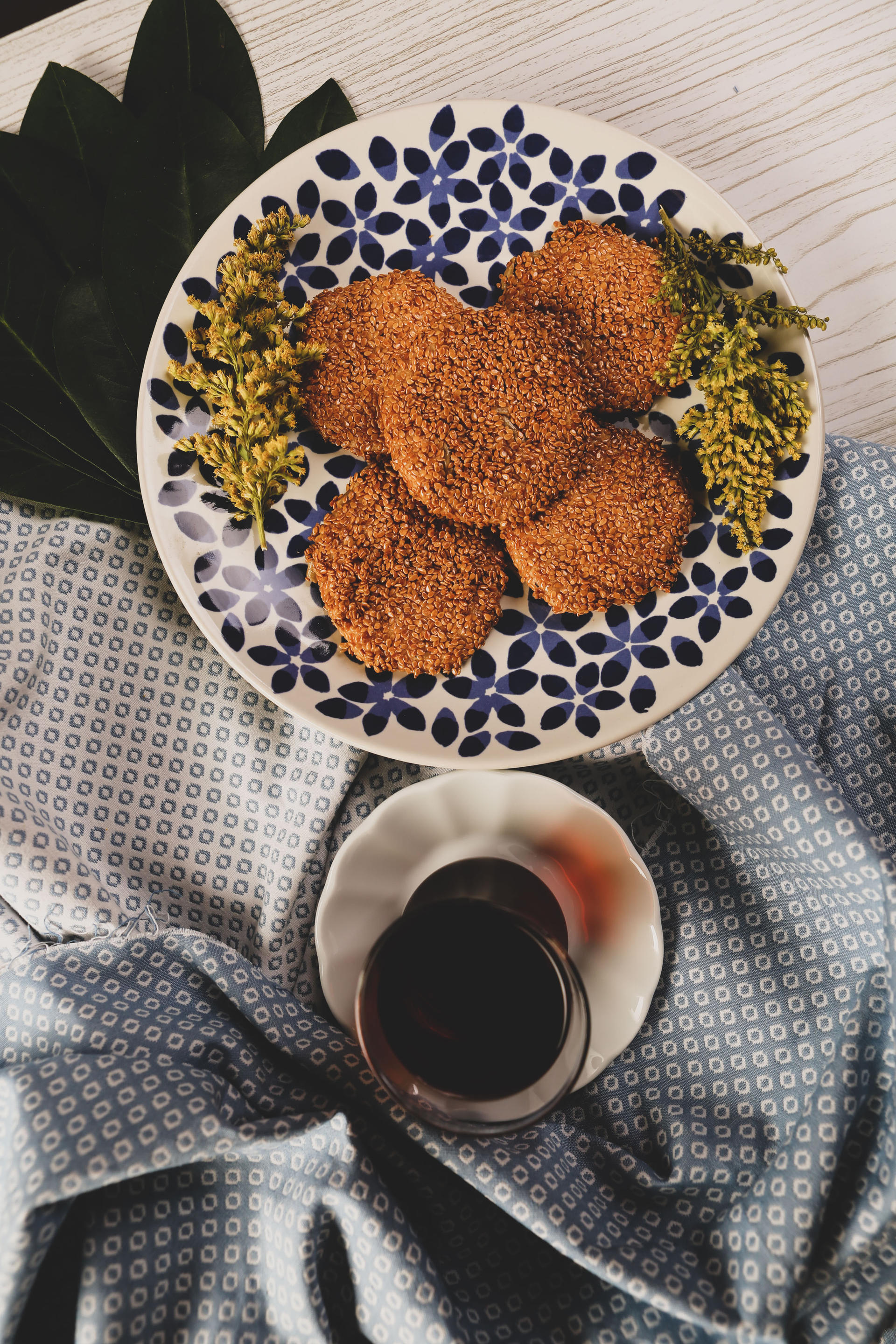 Overhead flat-lay of all ingredients for Lebanese Meat Kibbeh with Mint and Pine Nuts laid out on a kitchen surface.