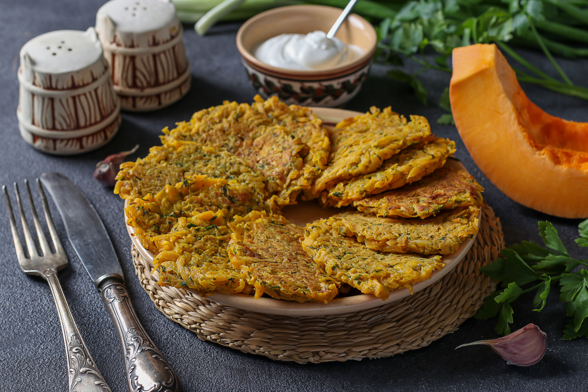 Overhead flat-lay of all ingredients for Lebanese Pumpkin Kibbeh with Tahini Herbal Sauce laid out on a kitchen surface.