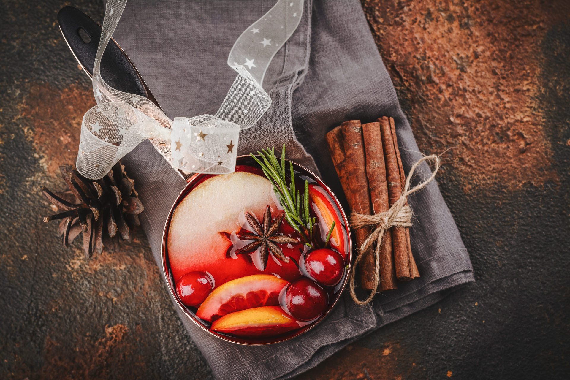 Overhead flat-lay of all ingredients for Luscious Alpine Mulled Wine Tart with Pear Compote laid out on a kitchen surface.