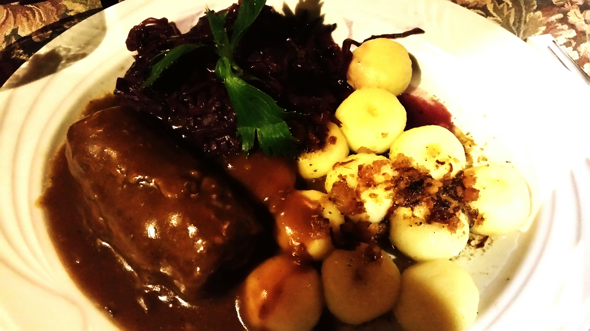 Overhead flat-lay of all ingredients for Luscious Irish Black Pudding with Apple Compote laid out on a kitchen surface.