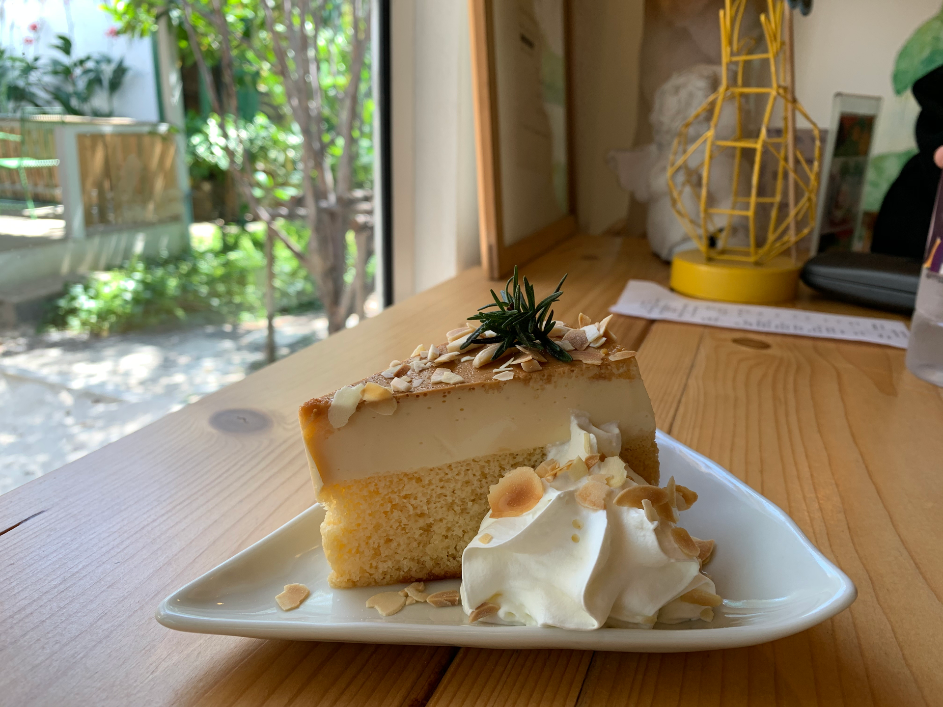 Overhead flat-lay of all ingredients for Luscious Mexican Tres Leches Cake with Espresso-Soaked Layers laid out on a kitchen surface.