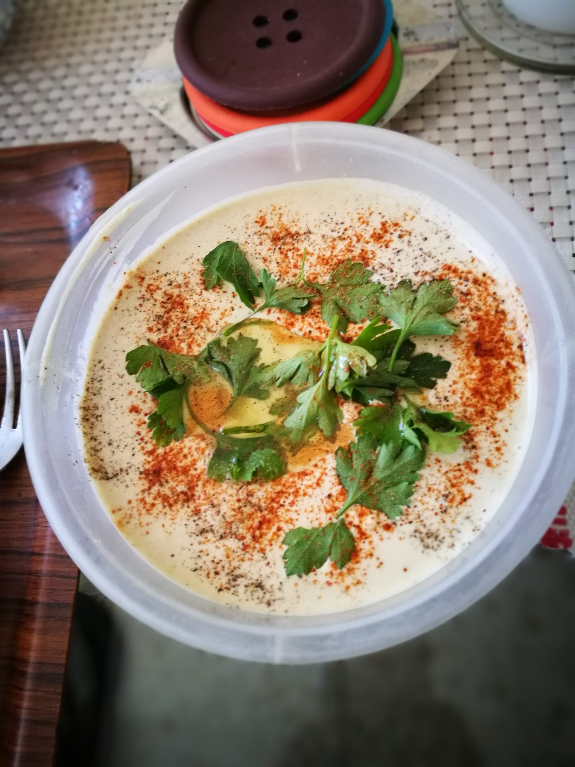 Overhead flat-lay of all ingredients for Luscious Spanish Almond Gazpacho laid out on a kitchen surface.