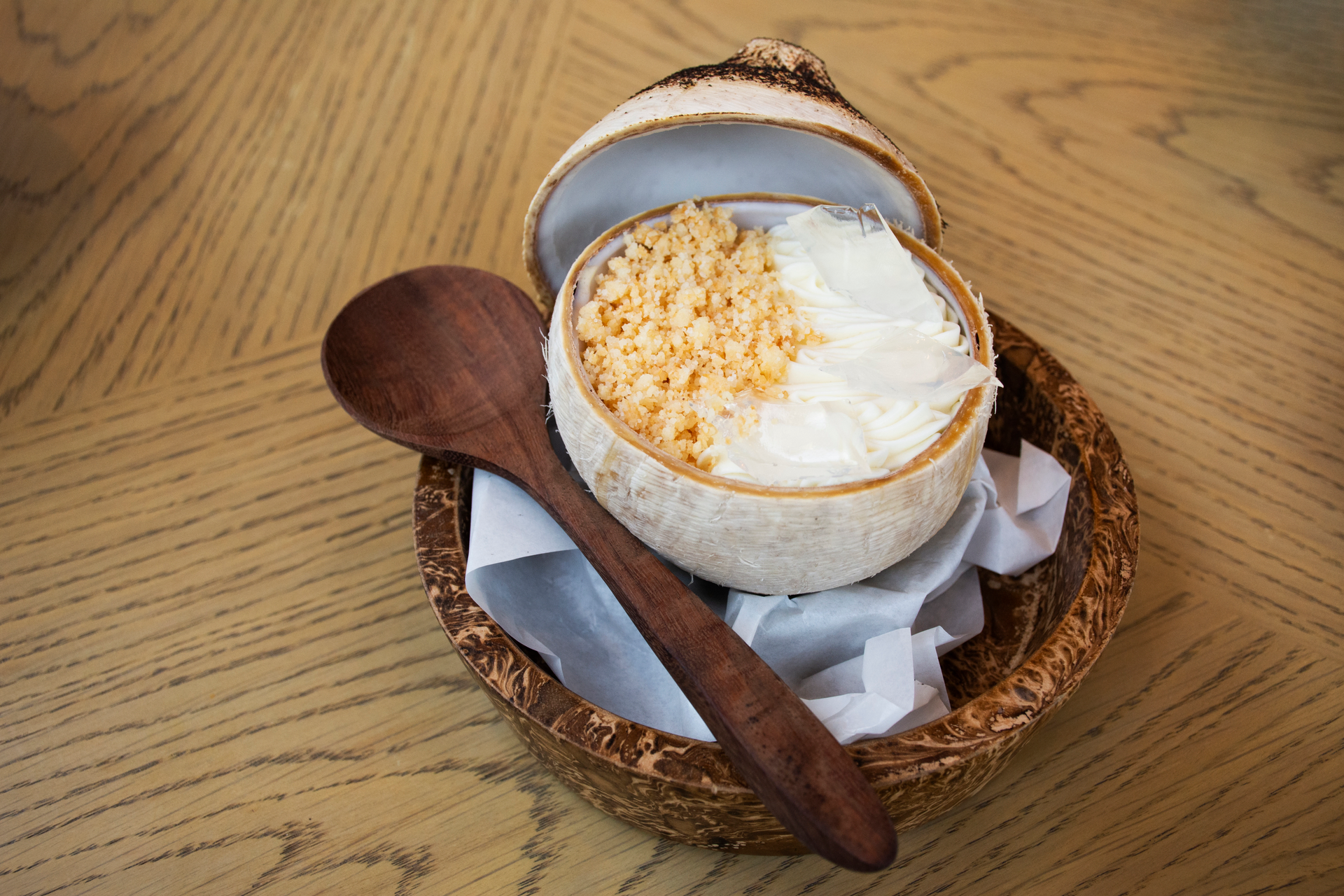 Lush Caribbean Cassava Pudding with Coconut Cream — Dessert served and photographed from above