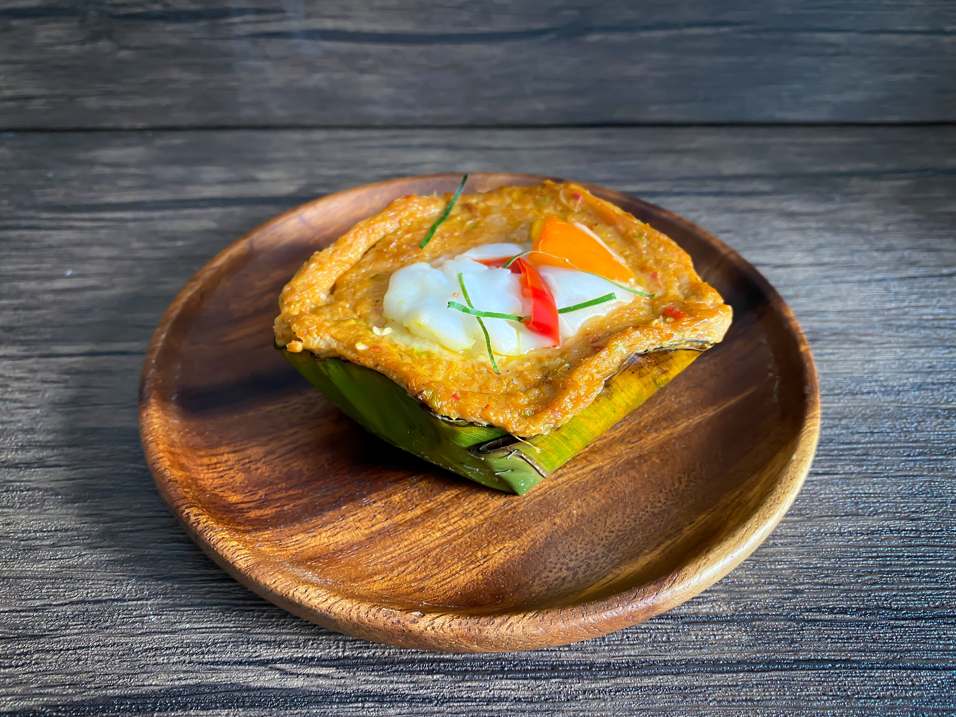 Overhead flat-lay of all ingredients for Lush Singaporean Kaya Toast French Toast with Pandan Drizzle laid out on a kitchen surface.