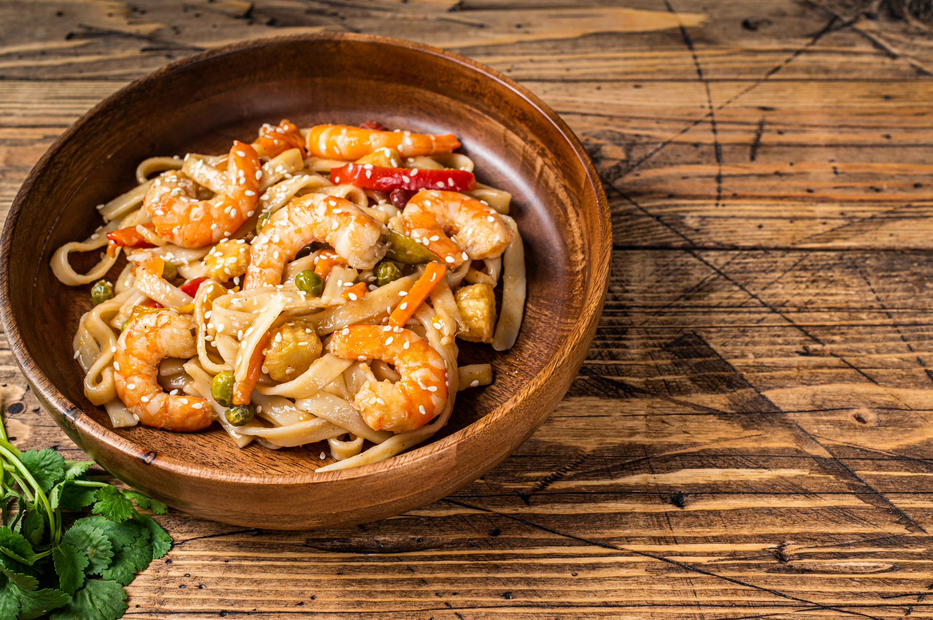 Overhead flat-lay of all ingredients for Malaysian Char Kway Teow with Prawns and Chinese Sausage laid out on a kitchen surface.