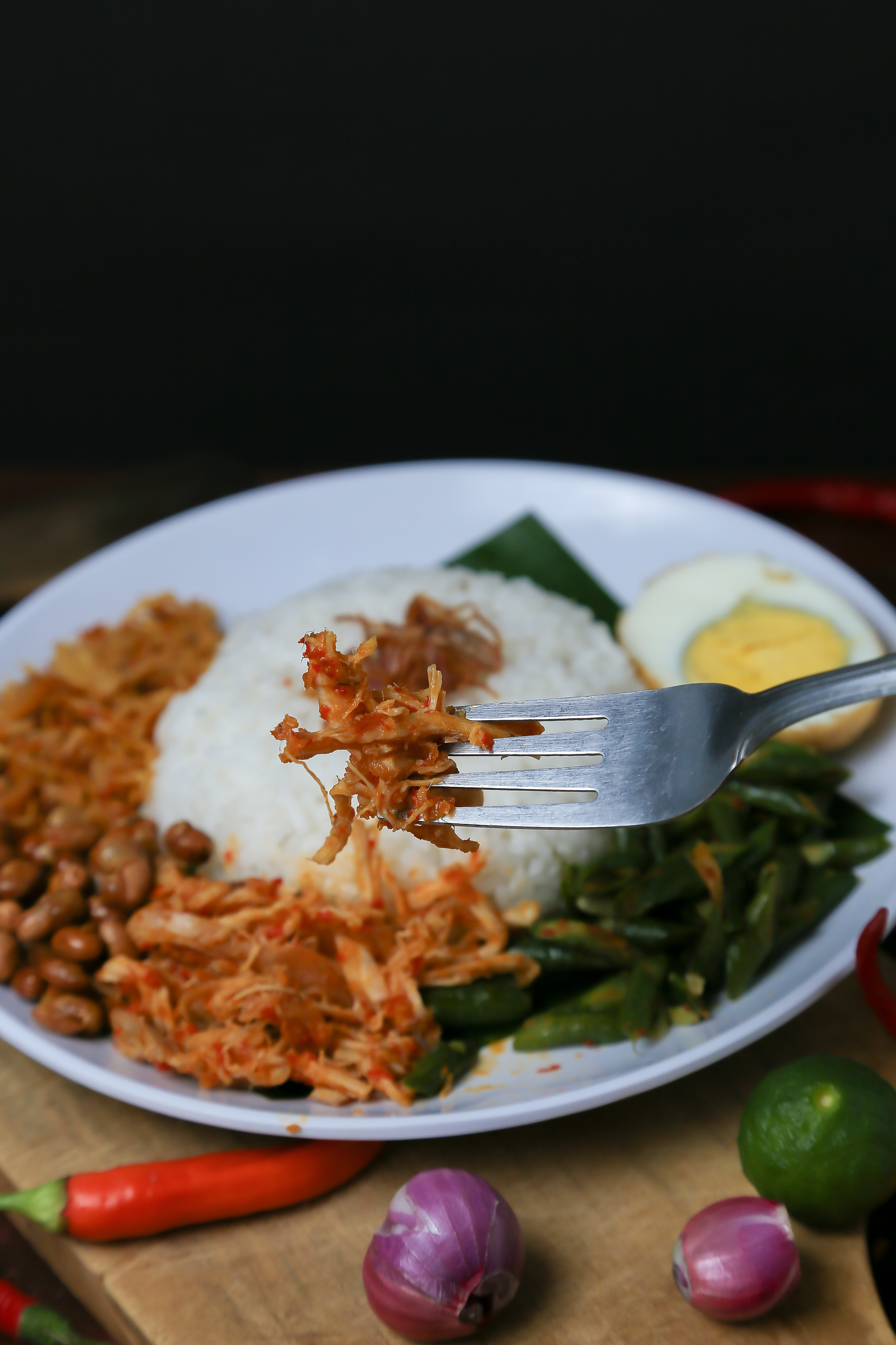 Malaysian Nasi Lemak with Coconut Rice and Sambal Ikan Bilis — Main Course served and photographed from above