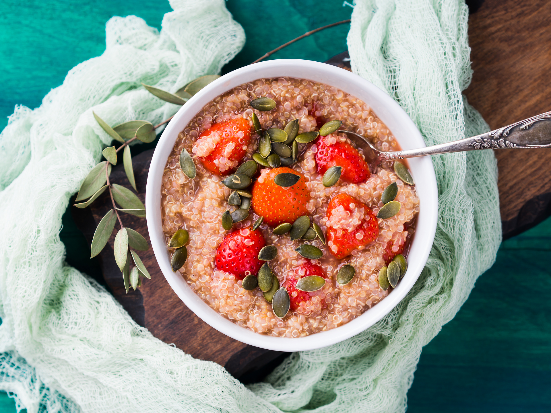 Overhead flat-lay of all ingredients for Mediterranean Spiced Lentil Dip with Sun-dried Tomatoes laid out on a kitchen surface.