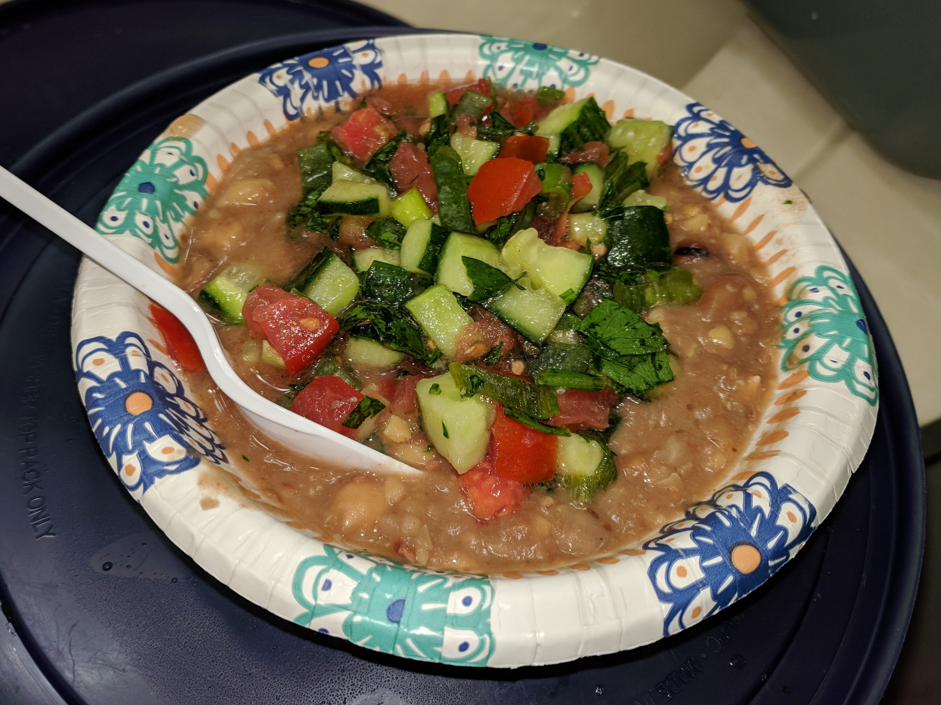 Middle Eastern Fava Bean Ful Medames with Tahini and Lemon — Main Course served and photographed from above