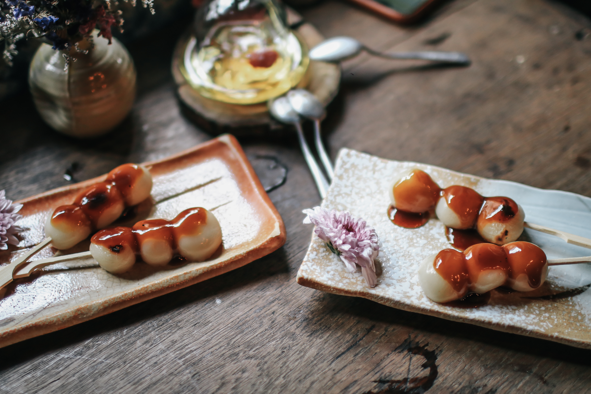 Overhead flat-lay of all ingredients for Mitarashi Dango with Sweet Soy Glaze laid out on a kitchen surface.