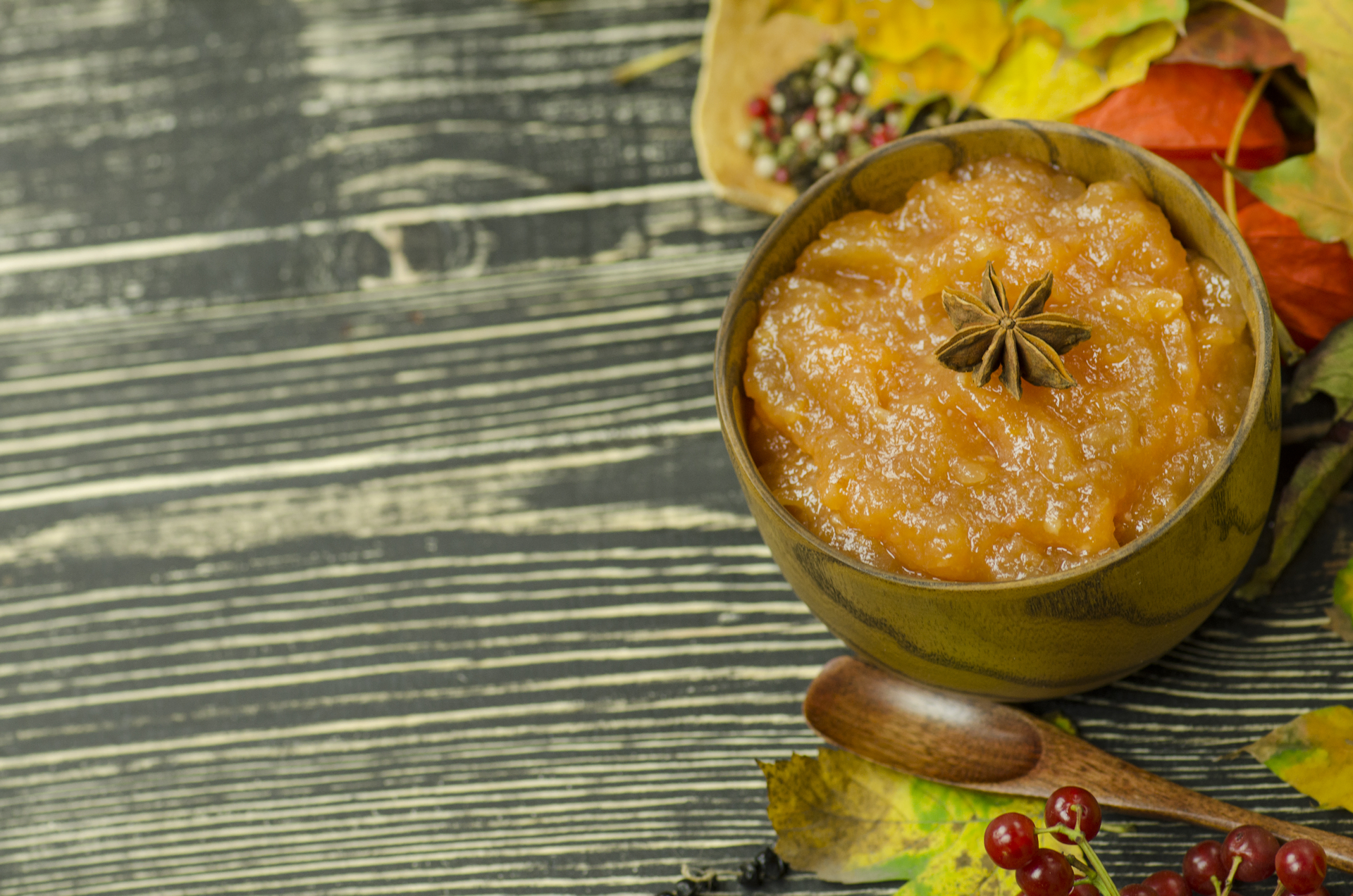 Overhead flat-lay of all ingredients for Moroccan Date and Orange Blossom Jam with Cardamom laid out on a kitchen surface.