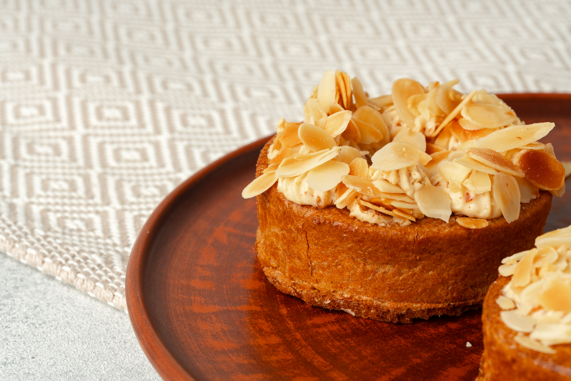 Overhead flat-lay of all ingredients for Moroccan Meskouta Cake with Orange Zest and Almond Cream laid out on a kitchen surface.