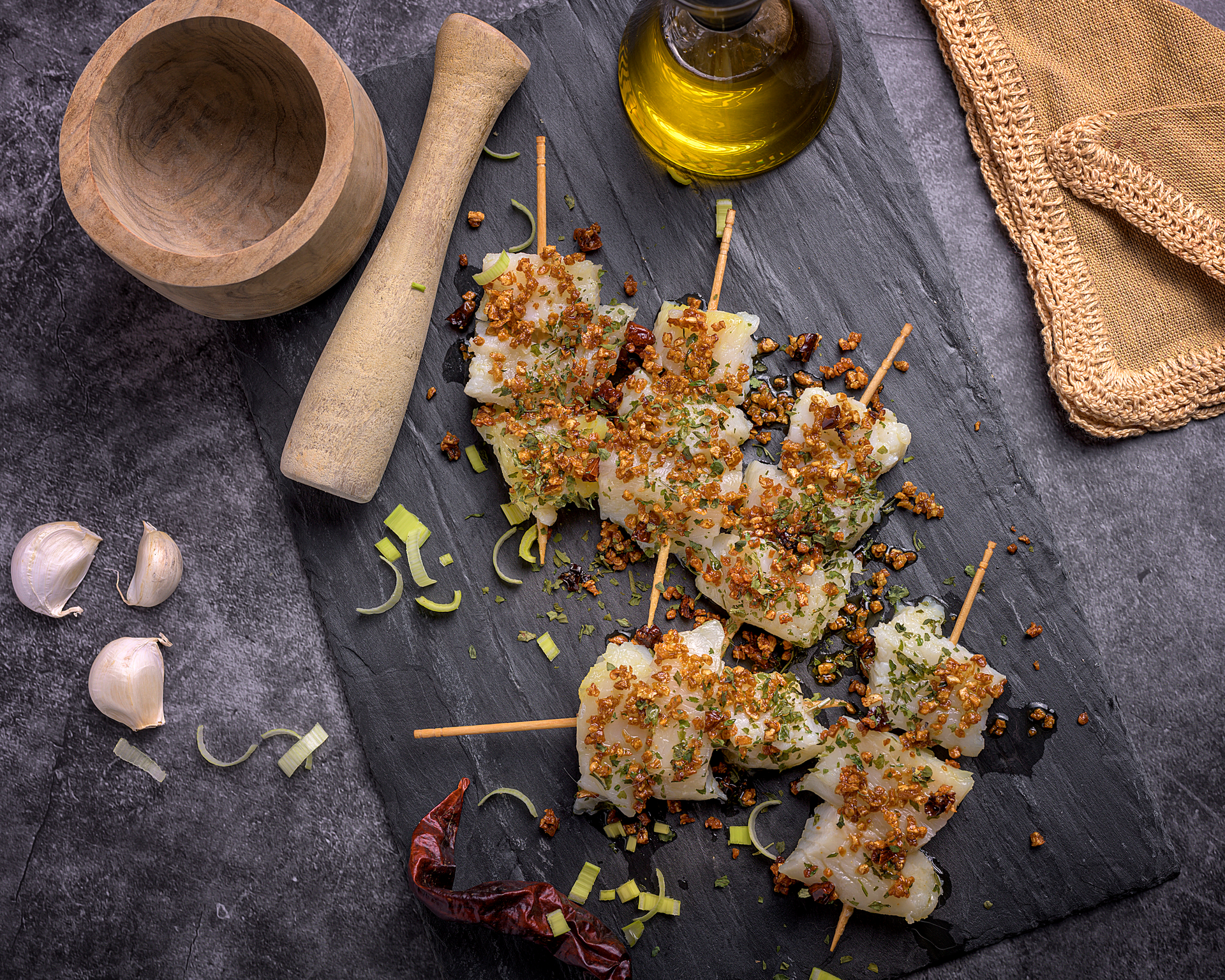 Moroccan Preserved Lemon and Olive Oregano Chicken Skewers — Appetizer served and photographed from above