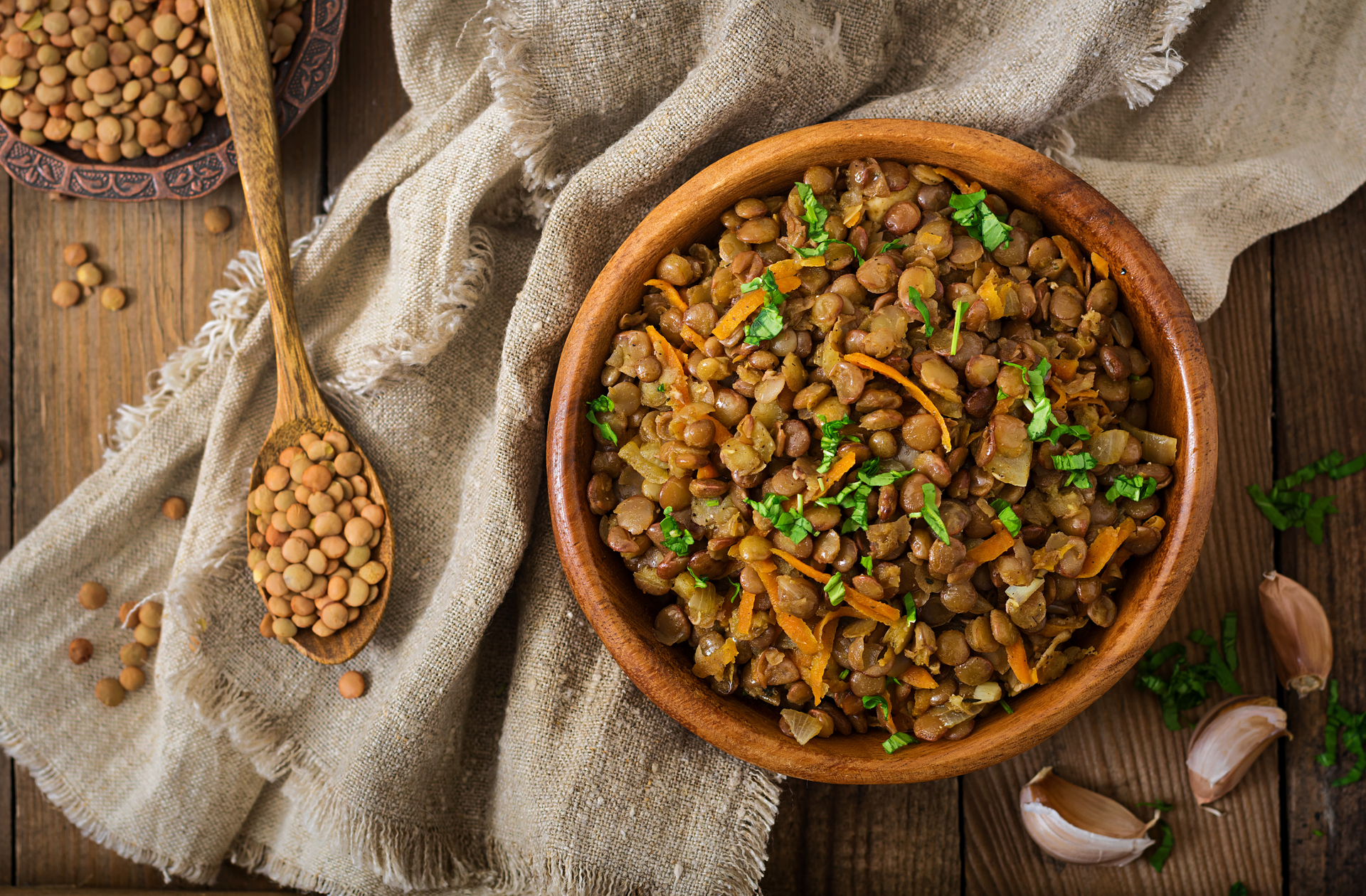 Overhead flat-lay of all ingredients for Moroccan Rfissa with Lentils and Fenugreek laid out on a kitchen surface.