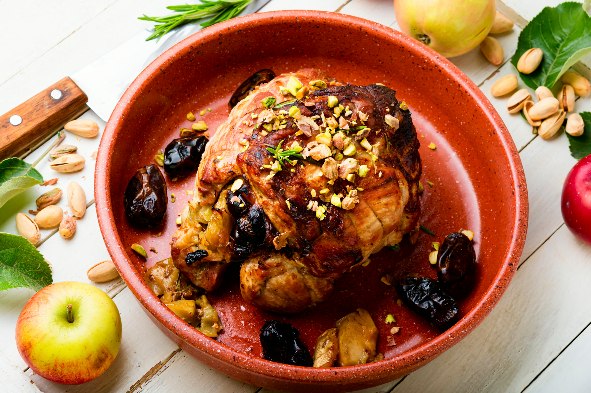 Overhead flat-lay of all ingredients for Moroccan Spiced Chicken with Date and Olive Relish laid out on a kitchen surface.