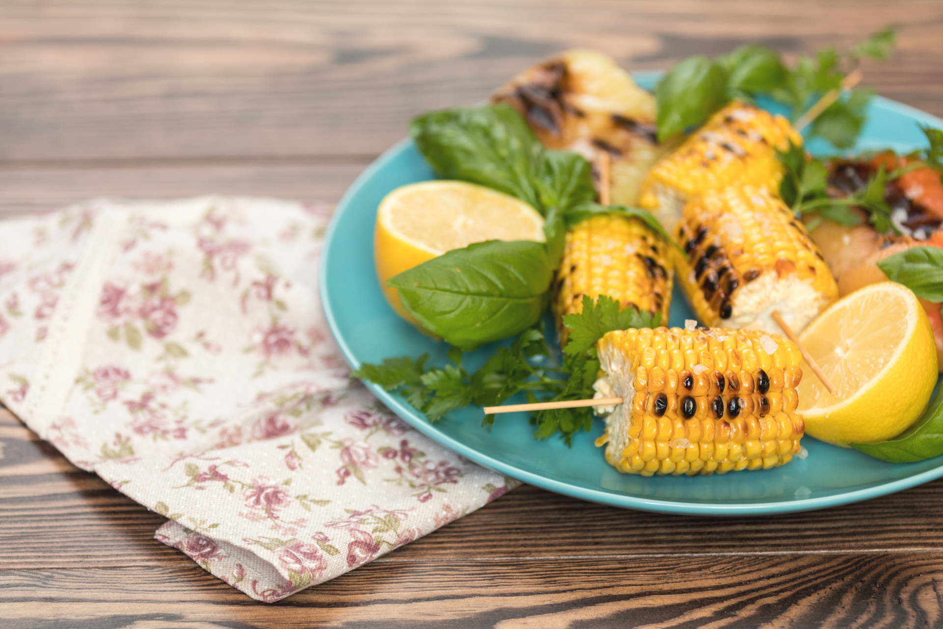 Overhead flat-lay of all ingredients for Moroccan Spiced Preserved Lemon Chicken Skewers with Minted Couscous laid out on a kitchen surface.