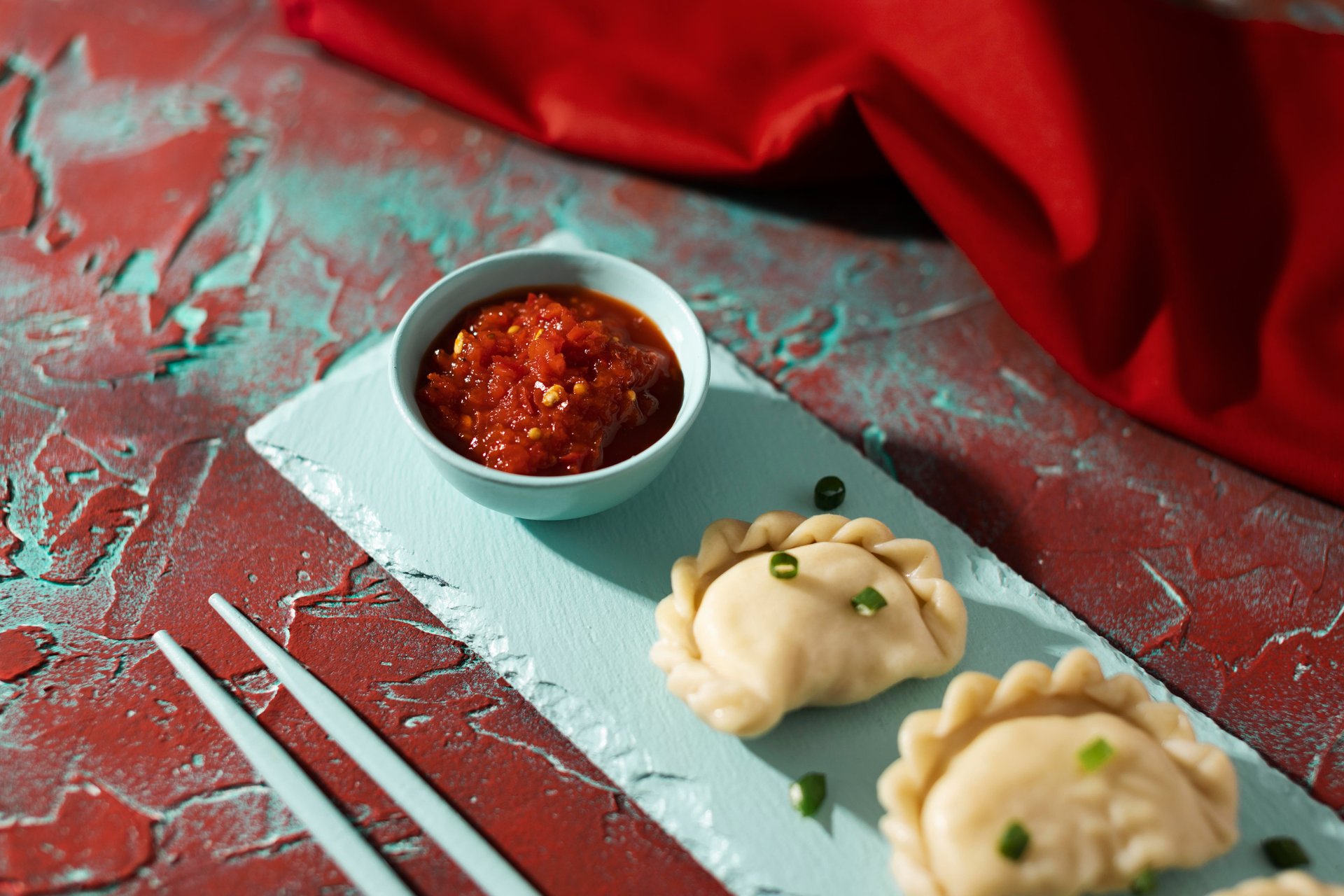 Nepalese Momo with Spicy Tomato Chutney — Appetizer served and photographed from above