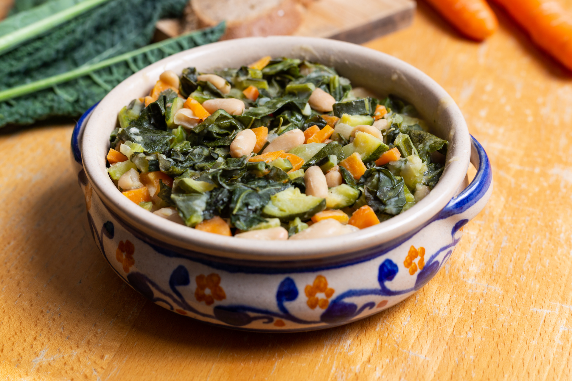Overhead flat-lay of all ingredients for Nigerian Egusi Soup with Spinach and Melon Seeds laid out on a kitchen surface.