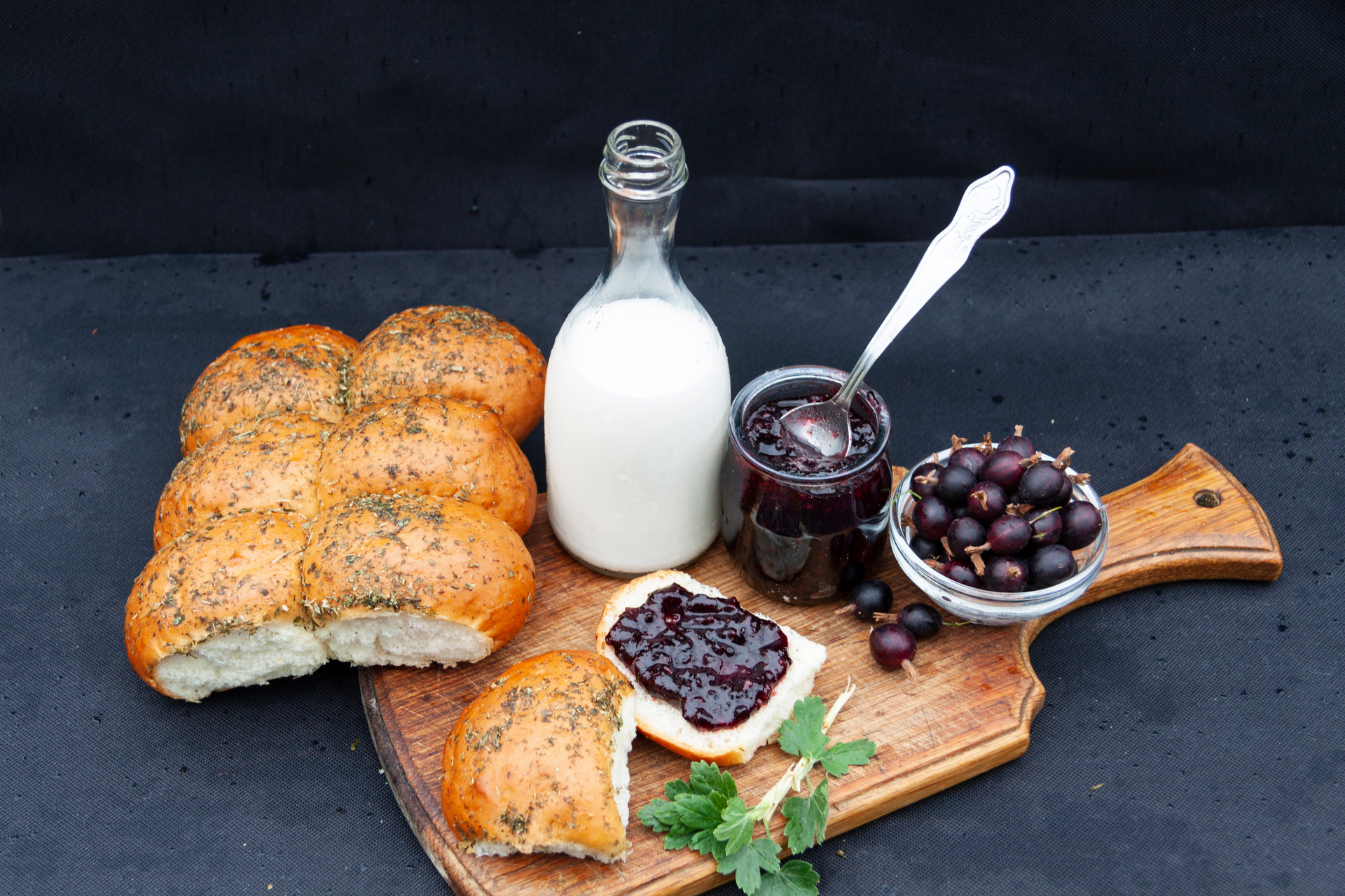 Overhead flat-lay of all ingredients for Nordic Blueberry Rye Bread with Cardamom Butter laid out on a kitchen surface.