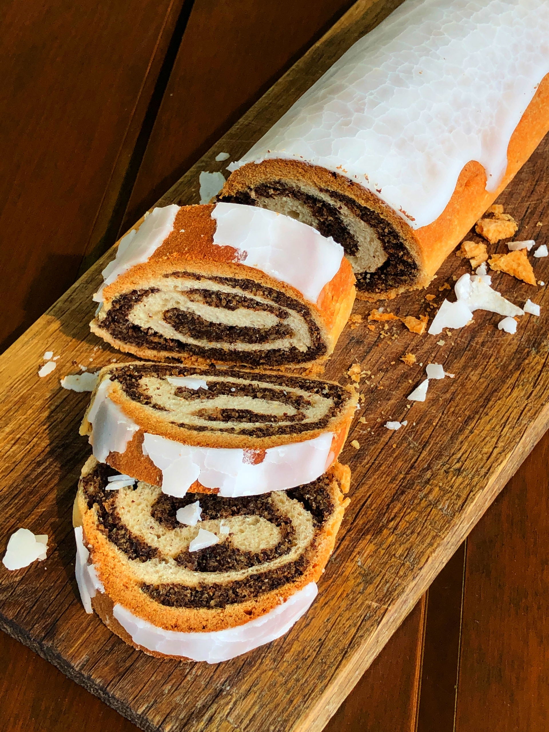 Overhead flat-lay of all ingredients for Nutty Polish Poppy Seed Roll with Lemon Icing laid out on a kitchen surface.