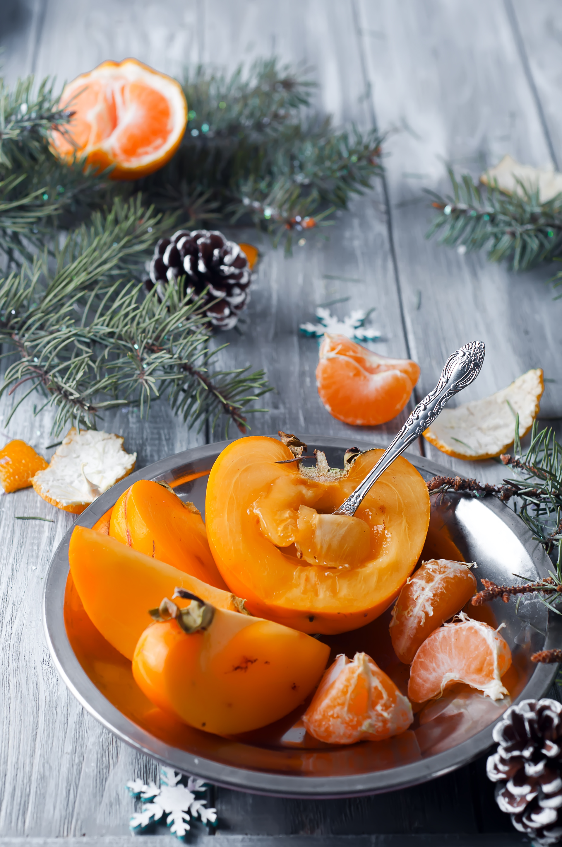 Overhead flat-lay of all ingredients for Persimmon and Honey Dessert laid out on a kitchen surface.