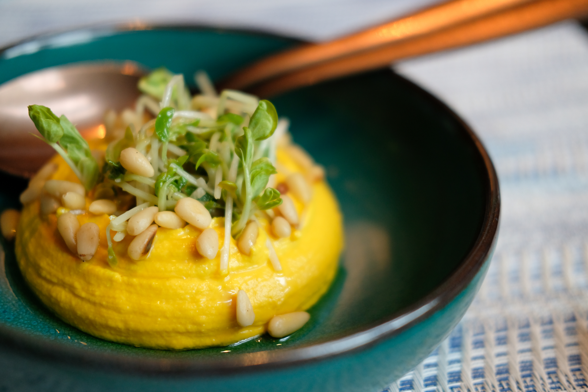 Overhead flat-lay of all ingredients for Peruvian Aji de Gallina with Walnuts and Spicy Aji Amarillo Sauce laid out on a kitchen surface.